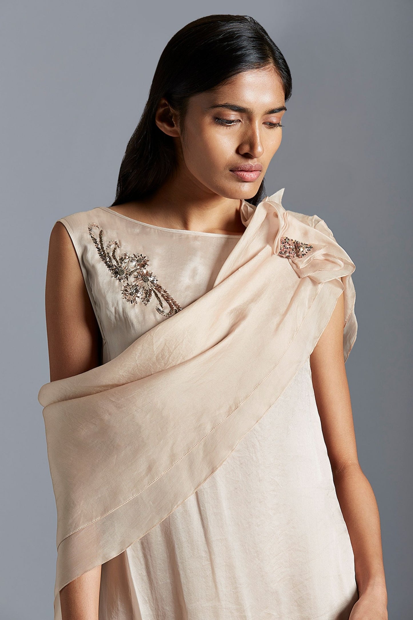 Close-up of the intricate Mukaish embroidery on the A-line gown, highlighting the detailed craftsmanship