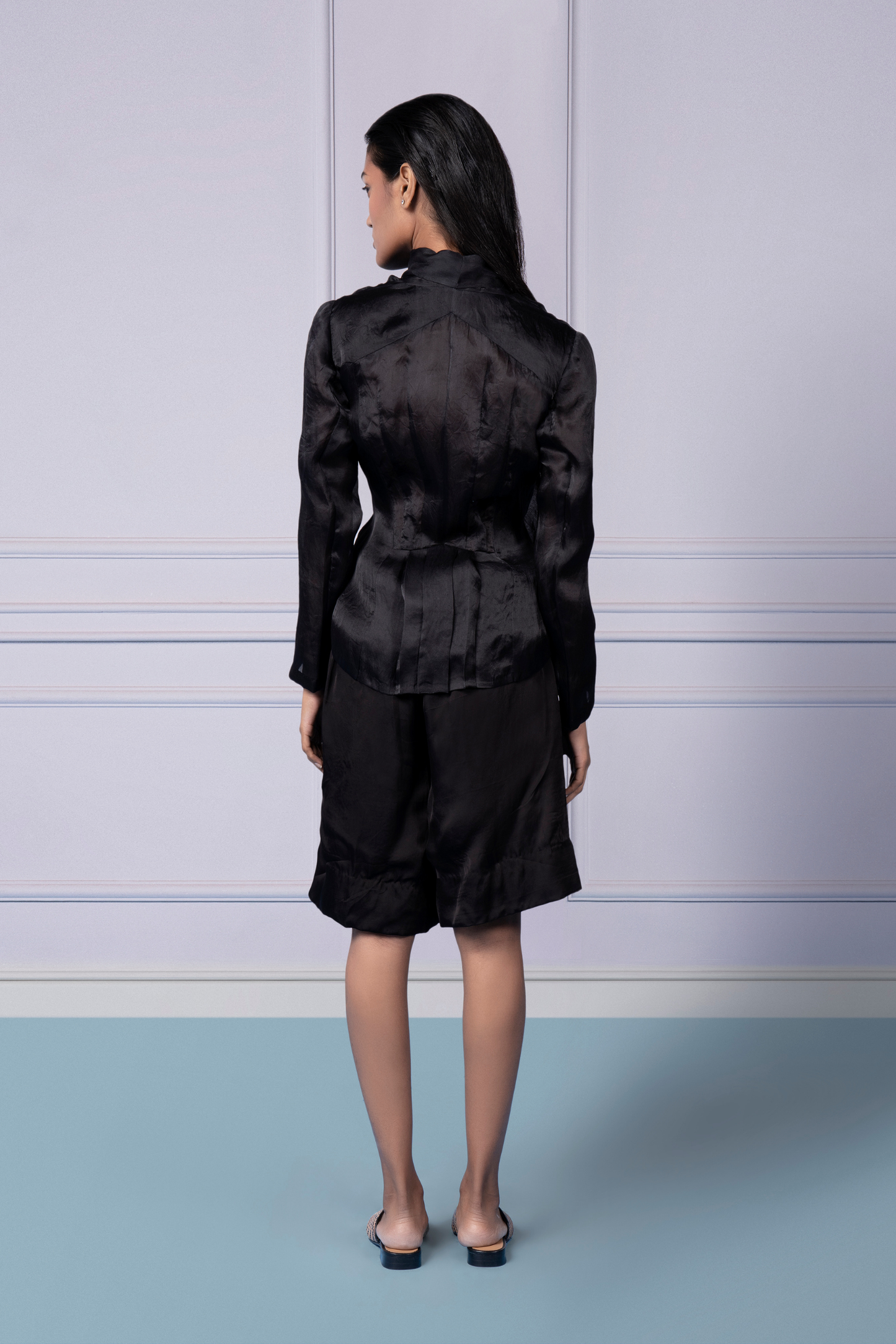 Back view of the stylish wrap organza jacket, highlighting the sheer back design and embroidery