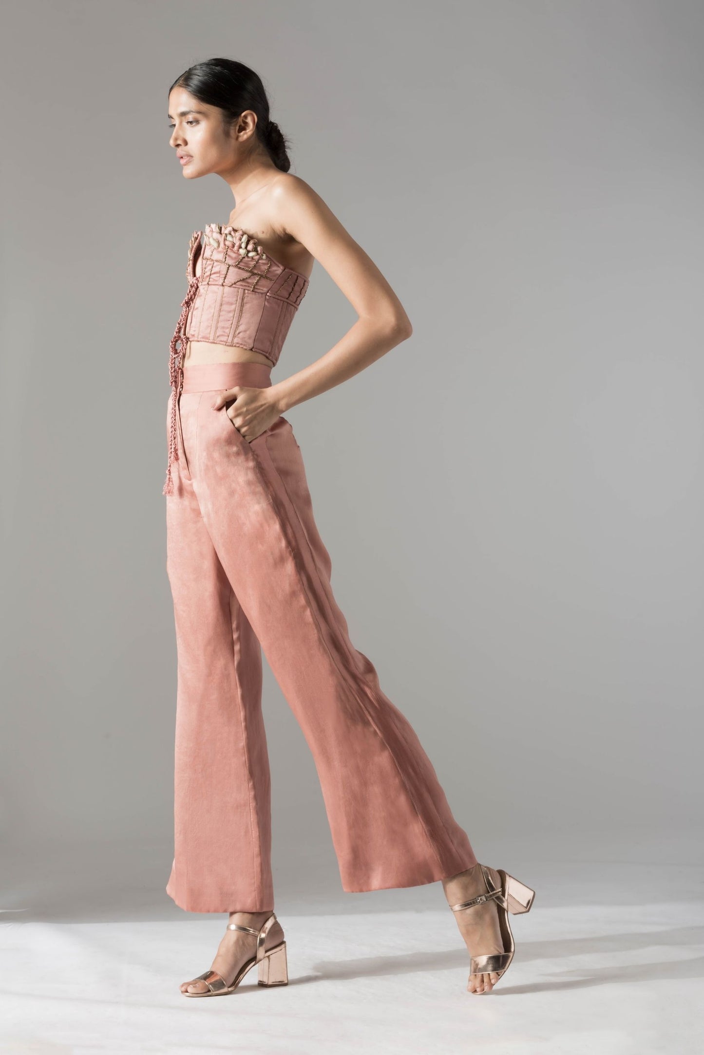 Side view of the Maze Scrawled top pant set, emphasizing the modern high-waisted fit and flow of the pants and top