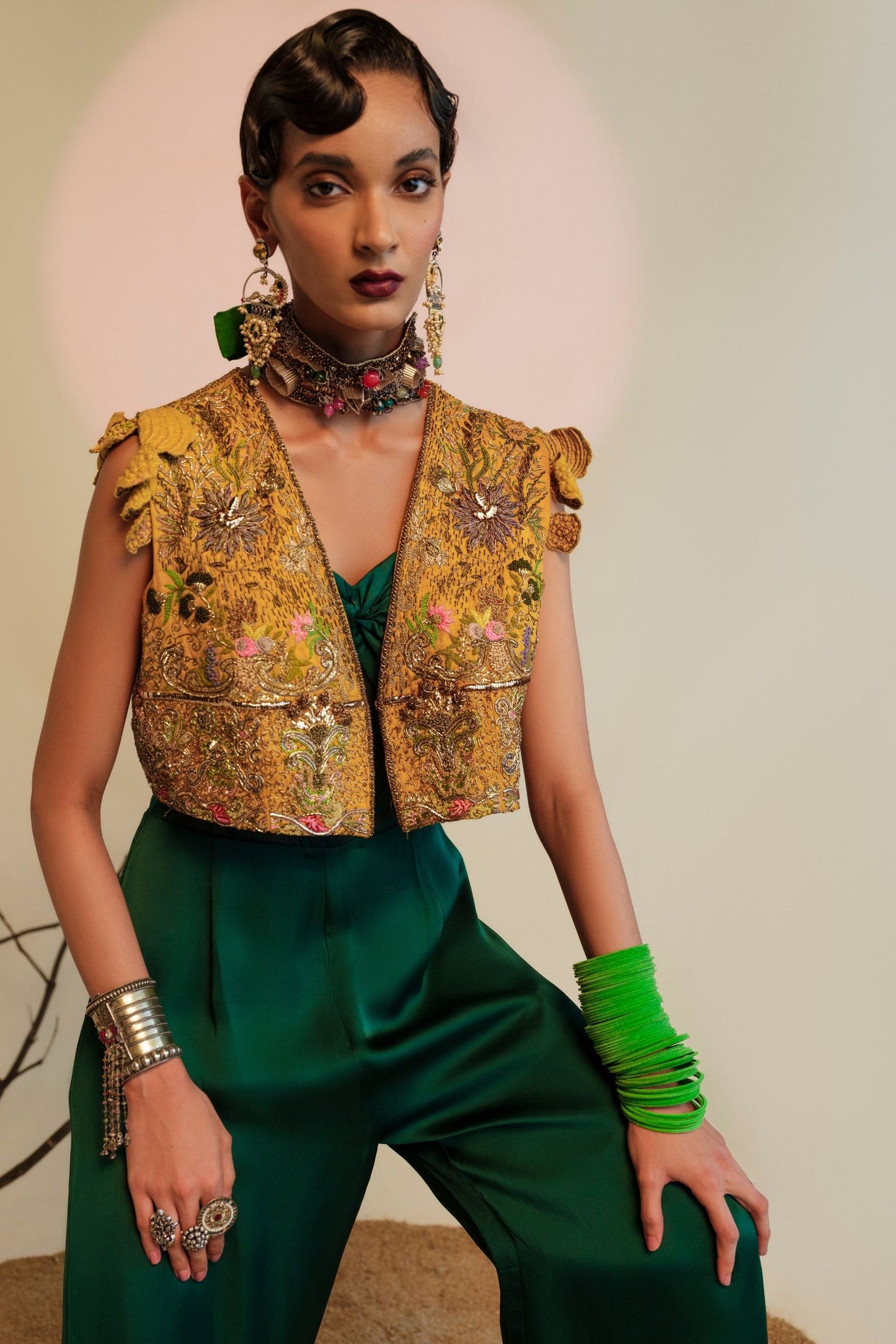 Namib Bottle Green Women's Jumpsuit with knotted bodice, sheer corset, and Paro Cropped Embroidered Jacket