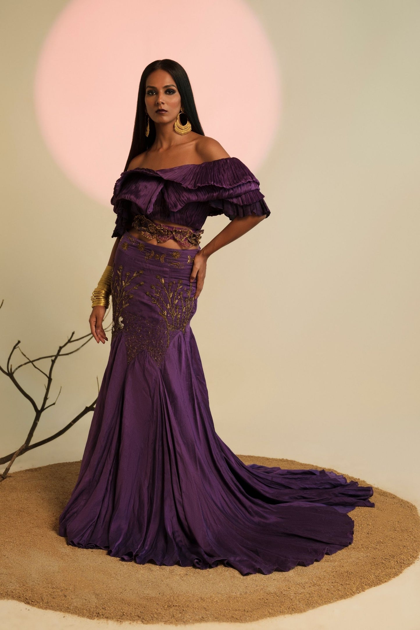 Purple Gill Fungi Textured Off-Shoulder Crop Top with layered ruching, paired with a designer long skirt featuring metallic embroidery