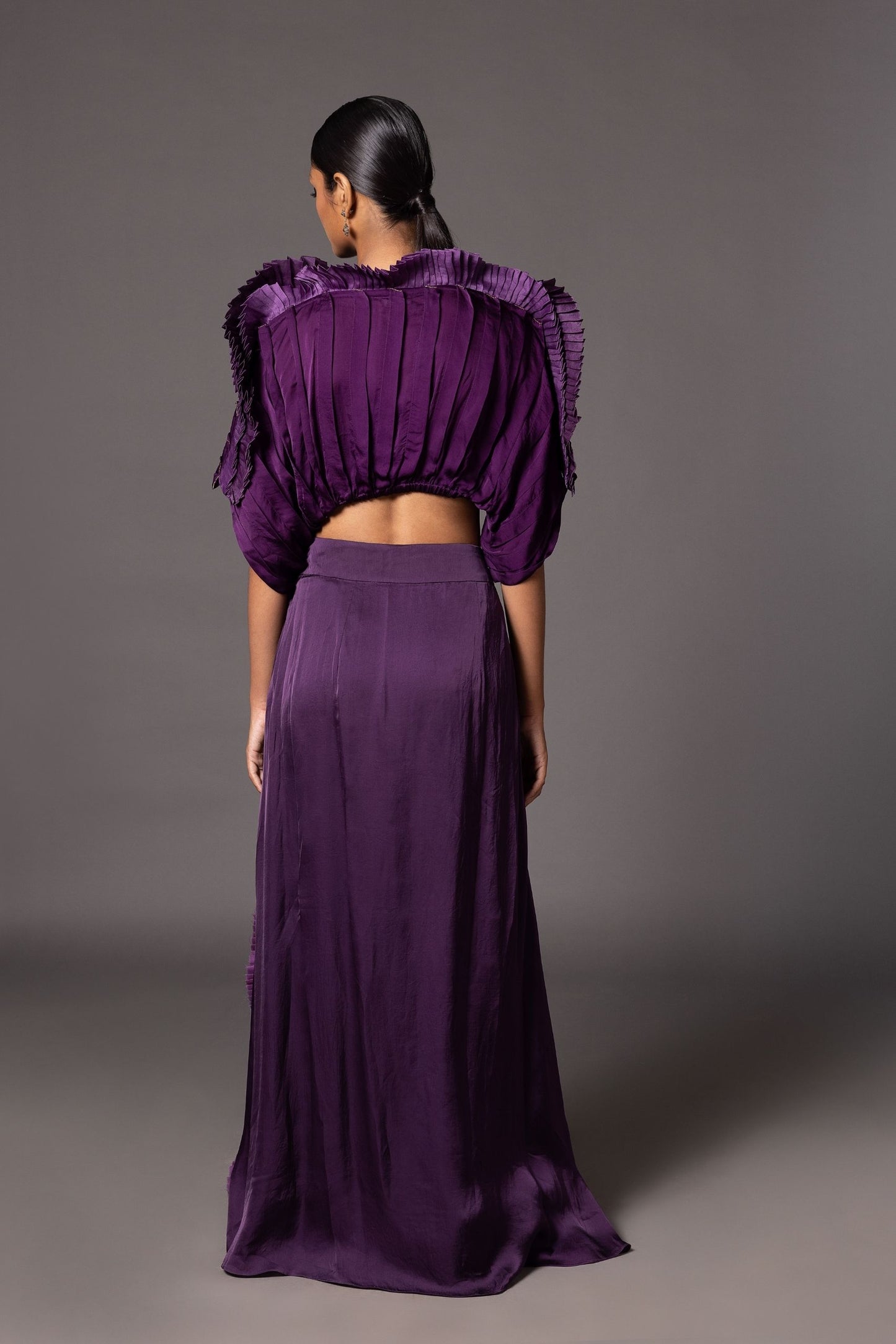 Back view of the Purple Mushroom Top and frill skirt, highlighting the overall silhouette and design