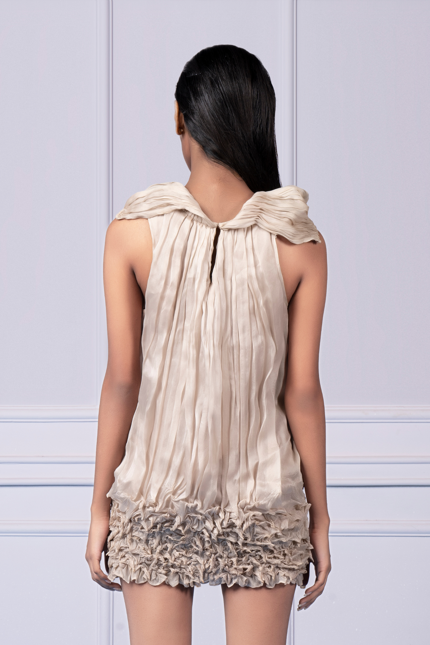 Back view showing the keyhole back design of the Wind Waft dress, emphasizing the stylish and modest details