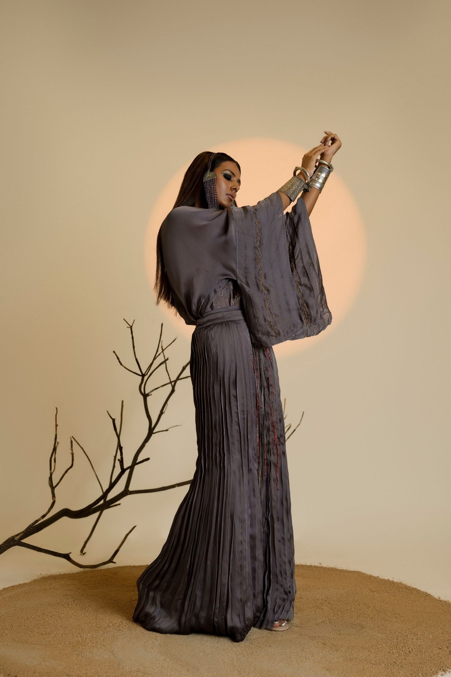 Shikhar Baugh Charcoal Kimono Top and pleated skirt set, showcasing the intricate embroidery and elegant pleating