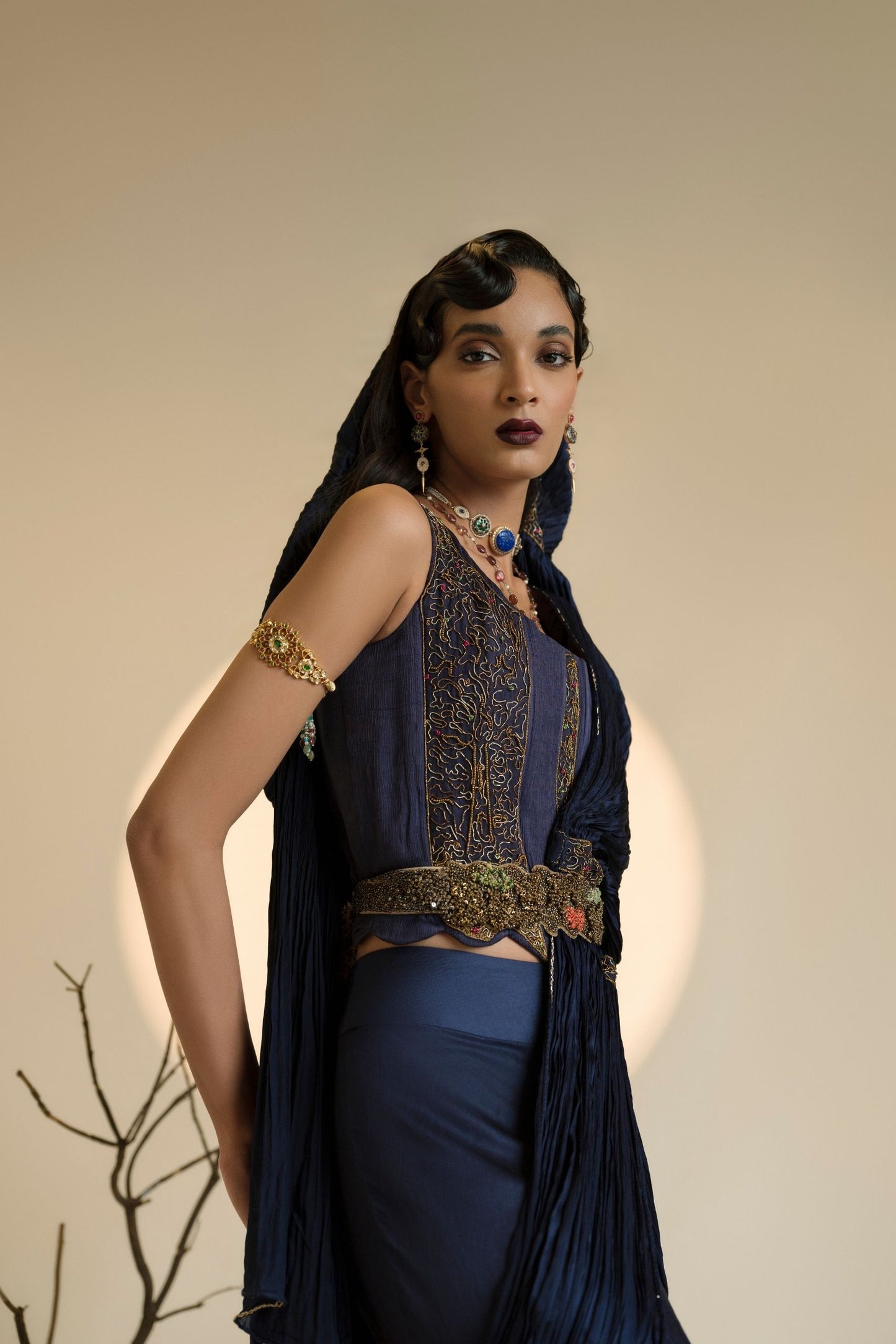 Close-up of the intricate 3D animal motifs and metallic embroidery on the Shikharbaugh Navy Blue Lehenga Set