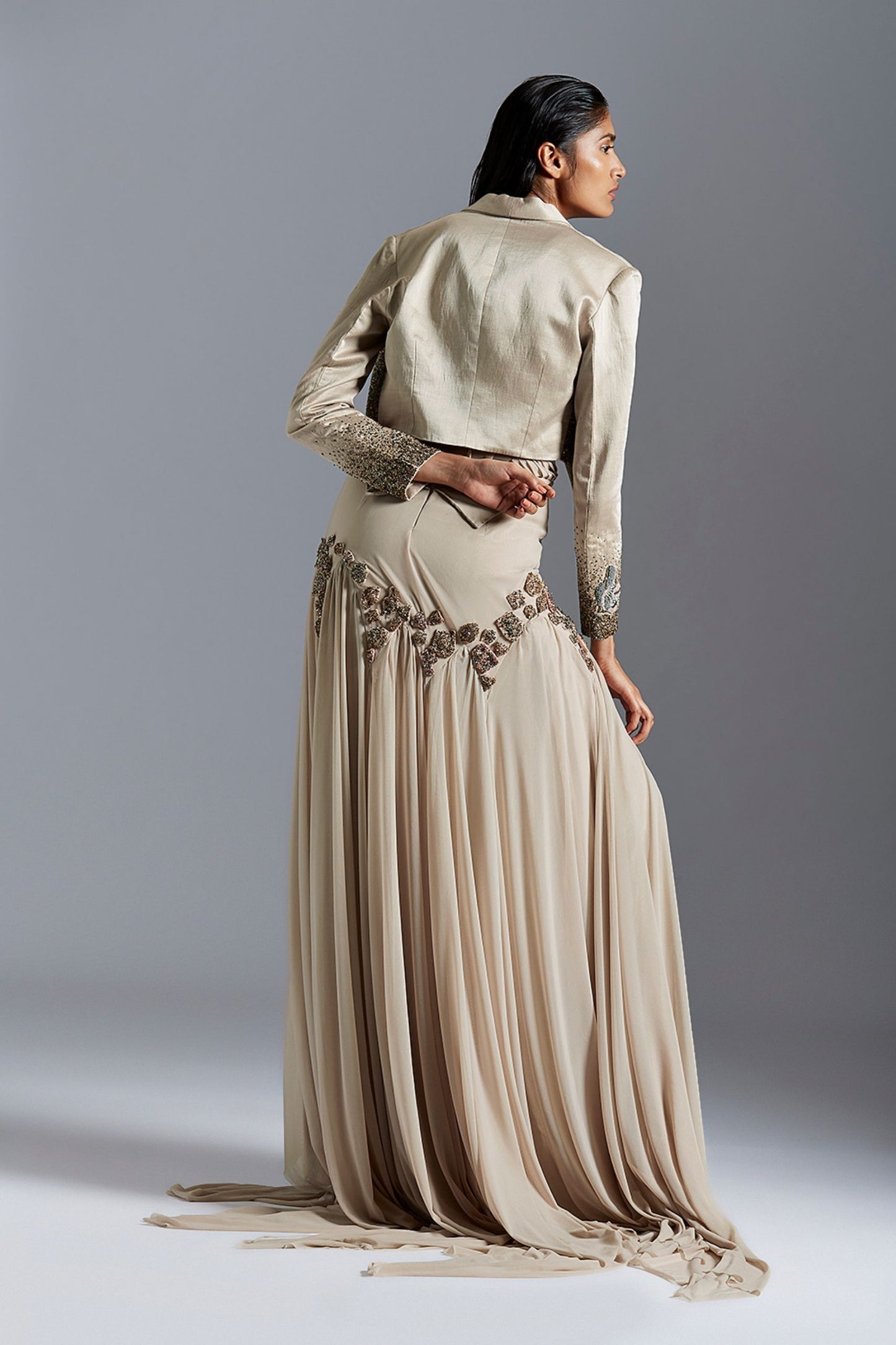 Back view of the couture gown with beaded tuxedo jacket, showcasing the beautiful detailing and elegant design