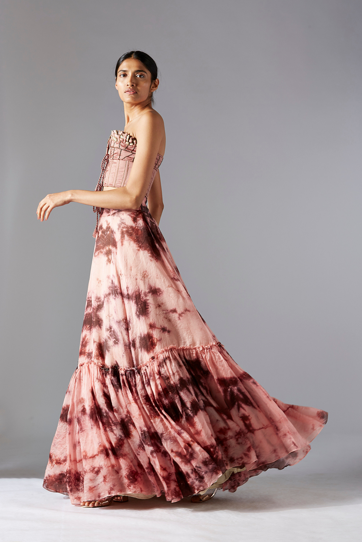 Stylish top skirt set for women with corset-style top and maze embroidery, paired with a flared batik skirt