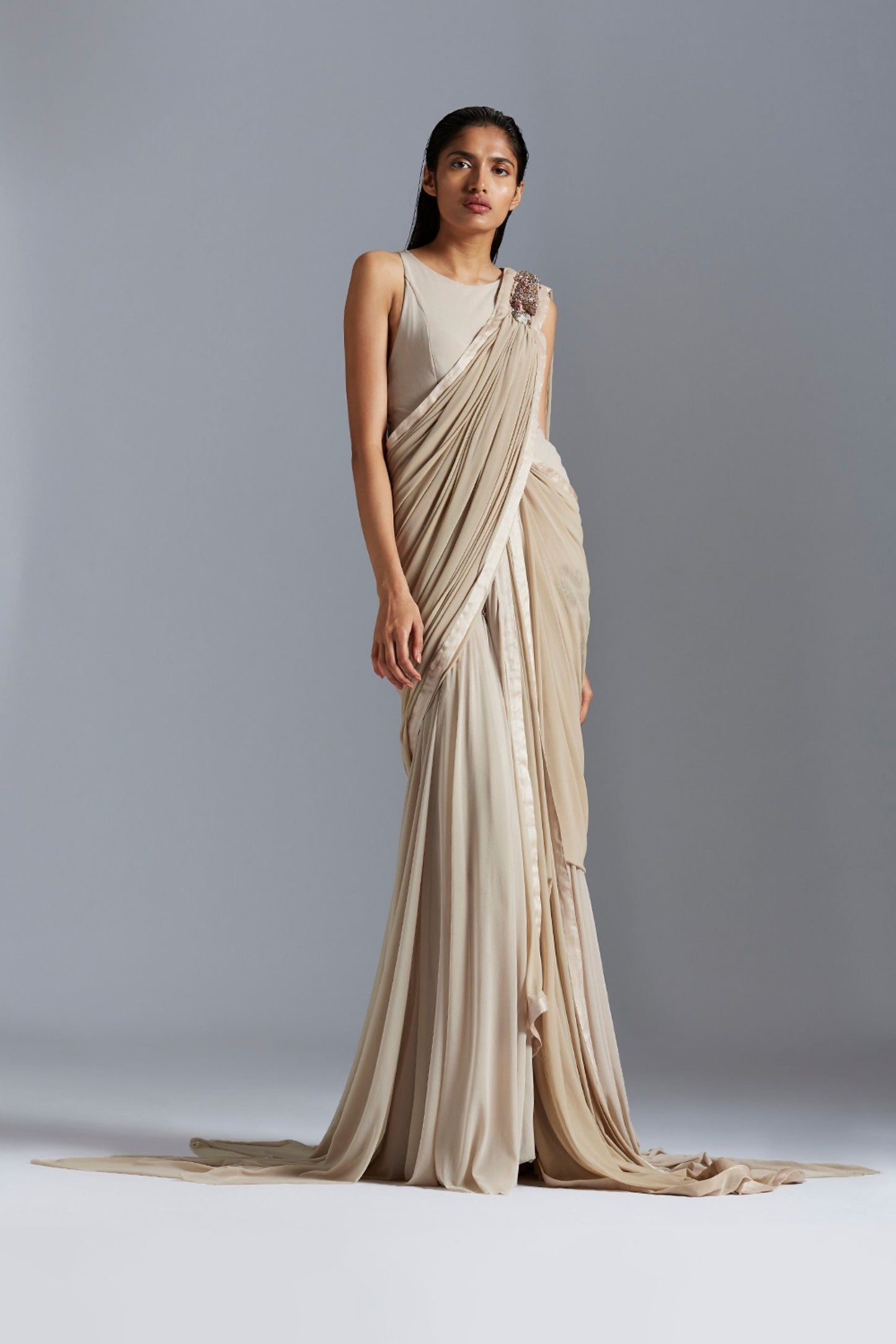 Elegant Icicle gown saree with handmade bead embroidery, offering a perfect blend of style and grace for women’s special occasions