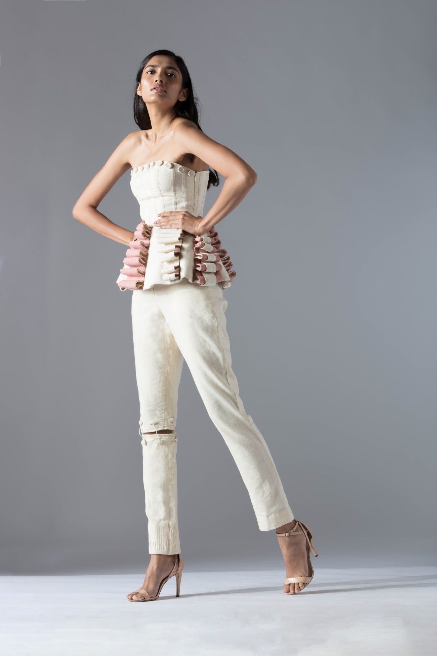 Full view of the peplum-style designer top for women in organic khadi, showcasing its modern silhouette and elegant design