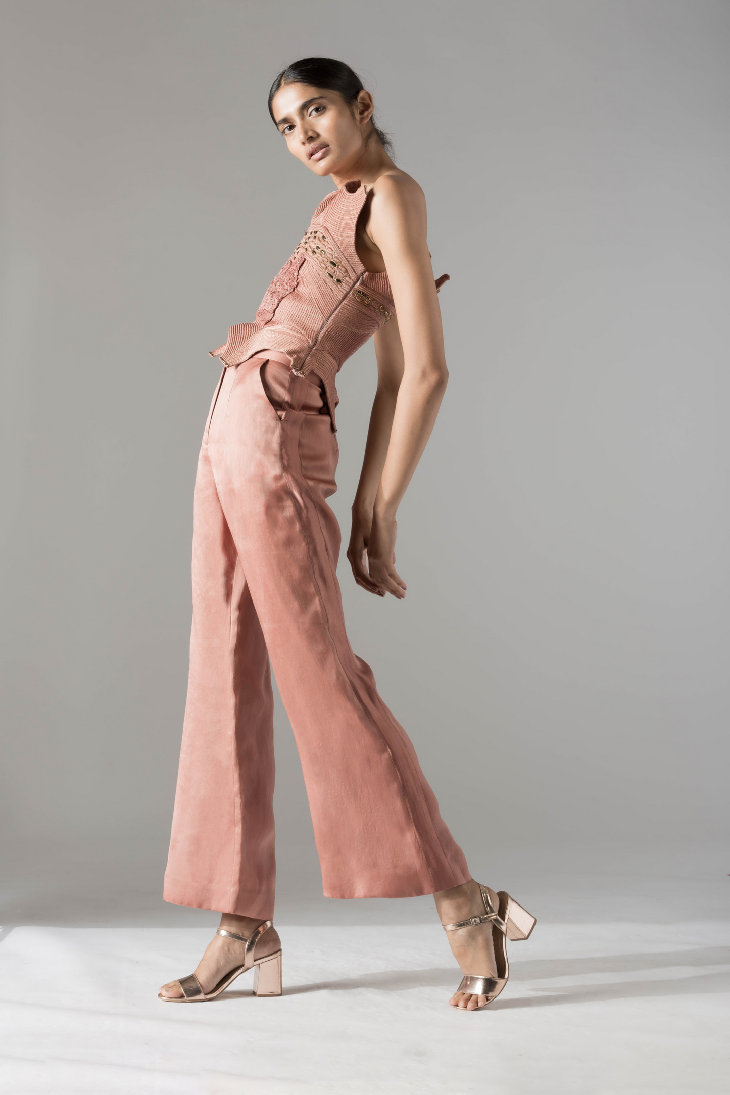 Model wearing the Dune corset top, demonstrating a modern and stylish look, perfect for any occasion