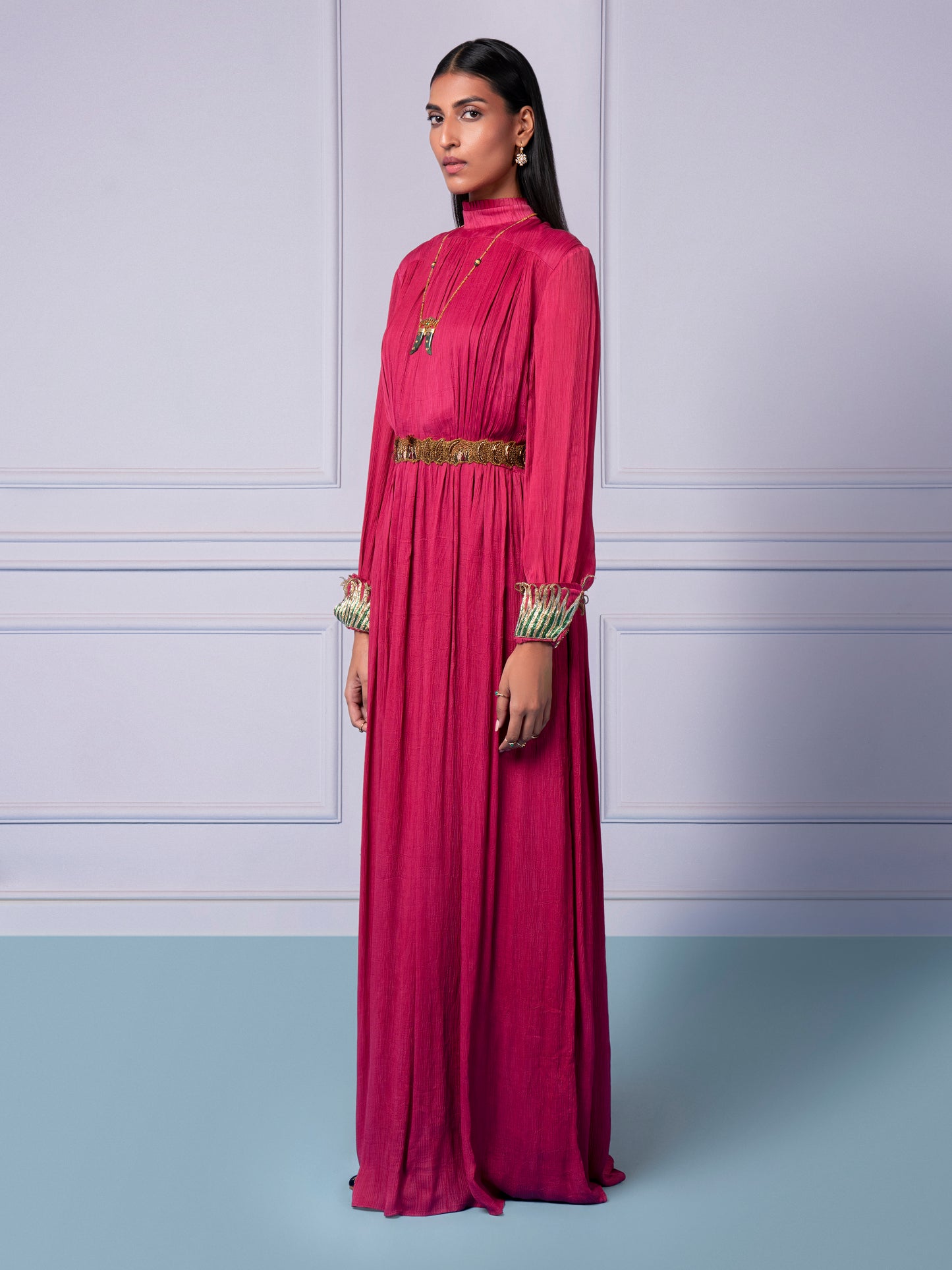 Full View of Rumi Pink Couture Gown with Metallic Belt, showcasing luxury women’s fashion