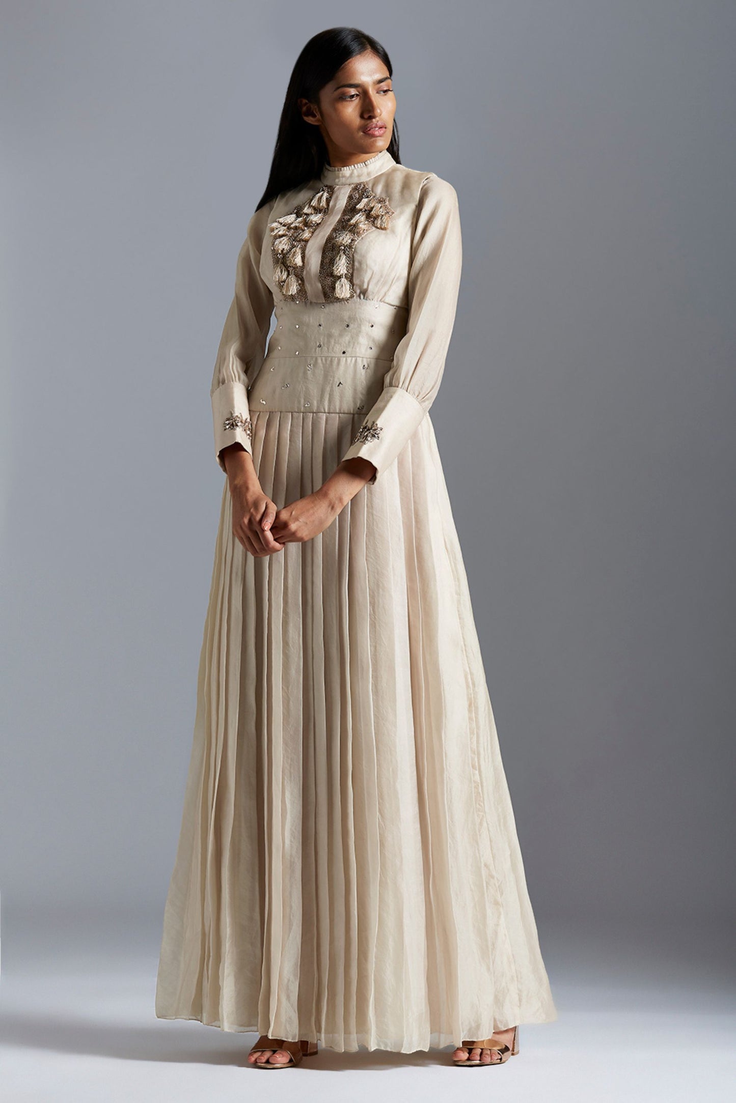 Stylish designer Victorian gown with handmade Mukaish work and pleating, offering a modern twist on classic elegance for women