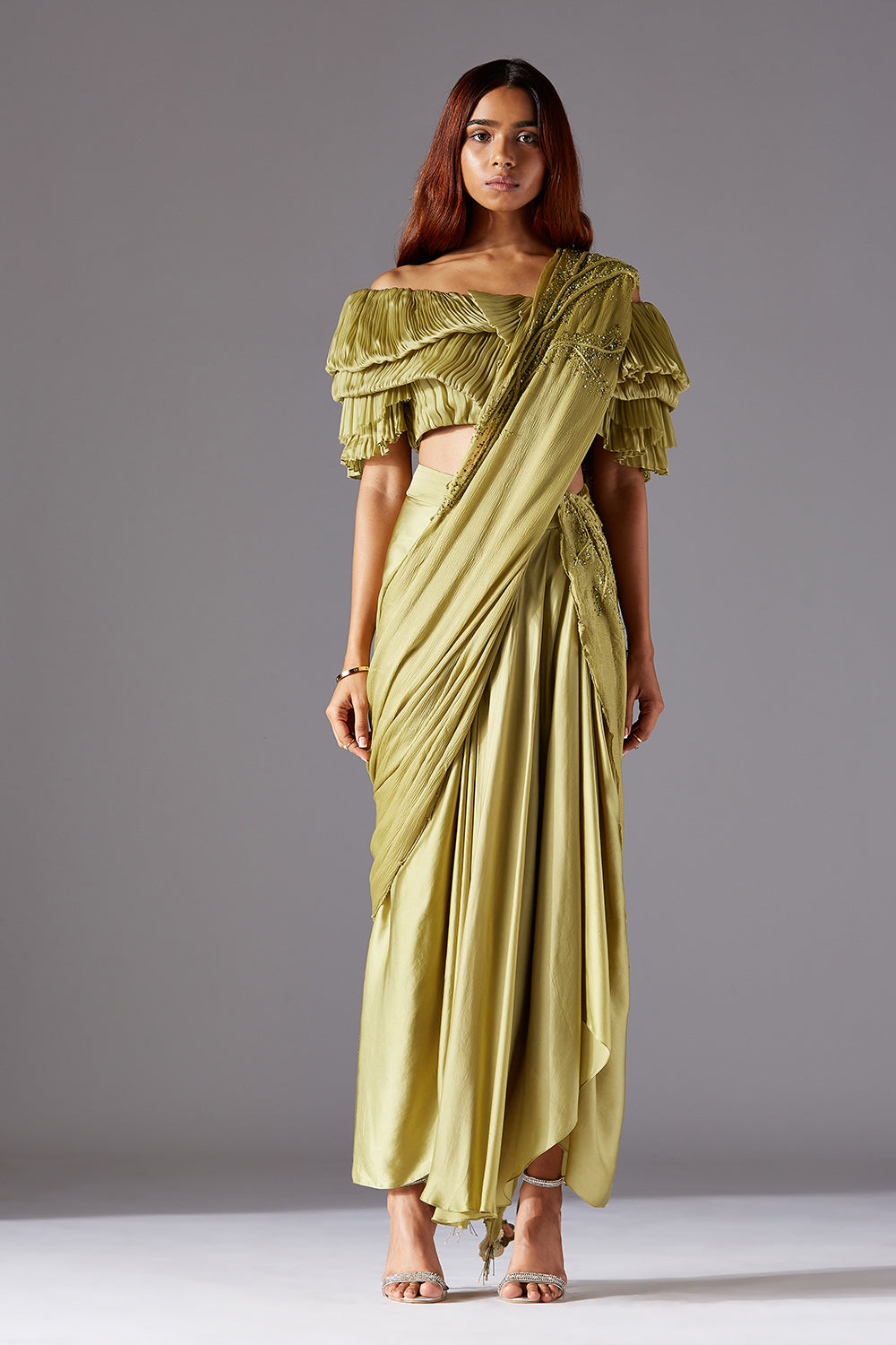 Elegant modern blouse paired with a draped long skirt and embroidered stole, styled for a sophisticated look