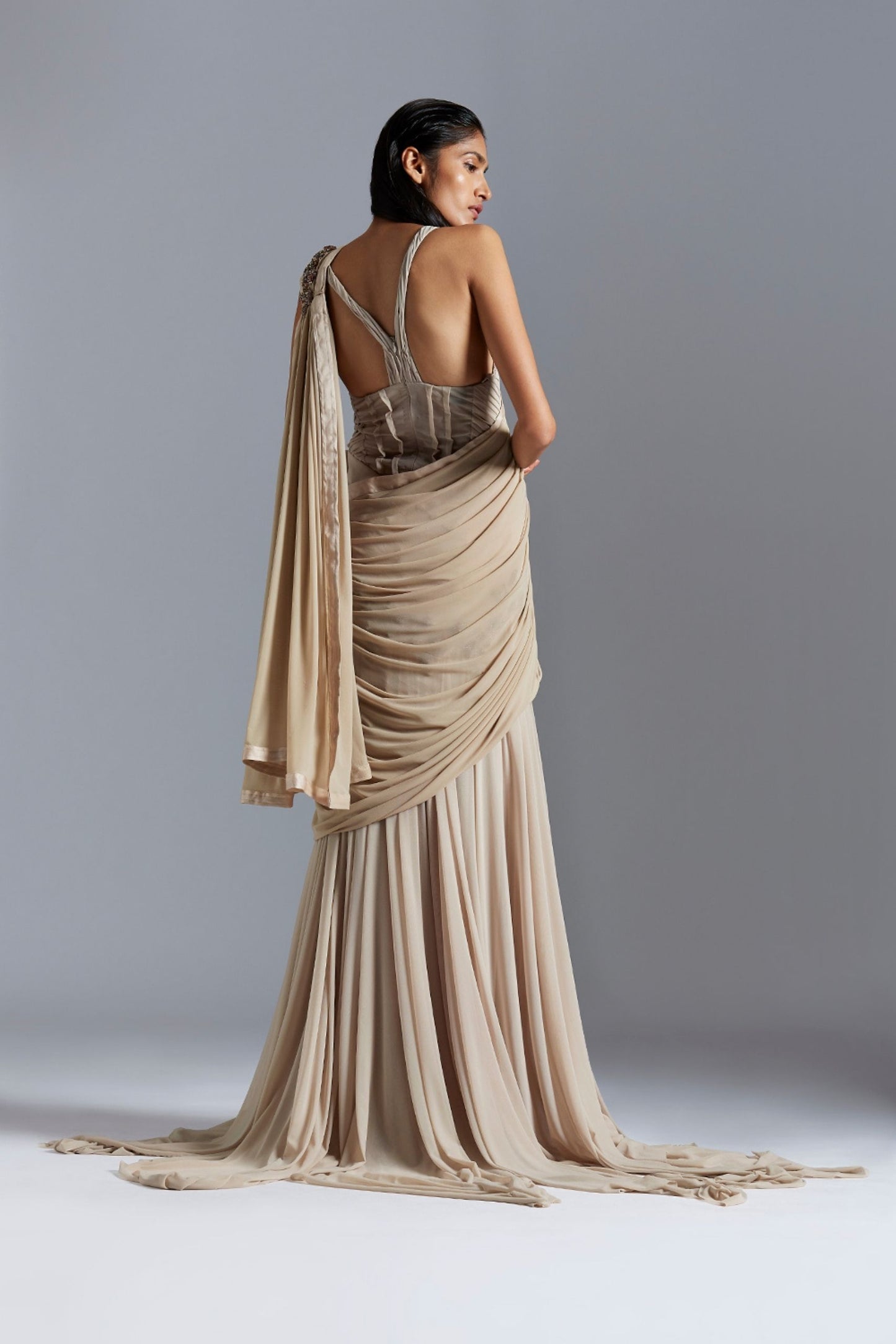 Back view of the Icicle gown saree, showcasing the flow and luxurious beadwork that enhances the overall design