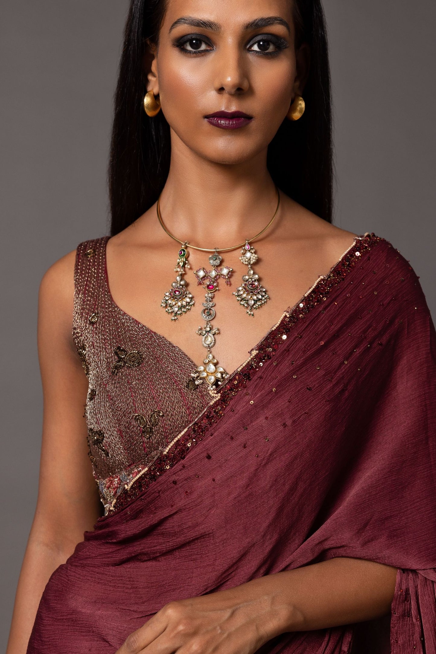 Close-up of the stunning beaded border and 3D leaf details on the Namib Maroon Sequin Sari