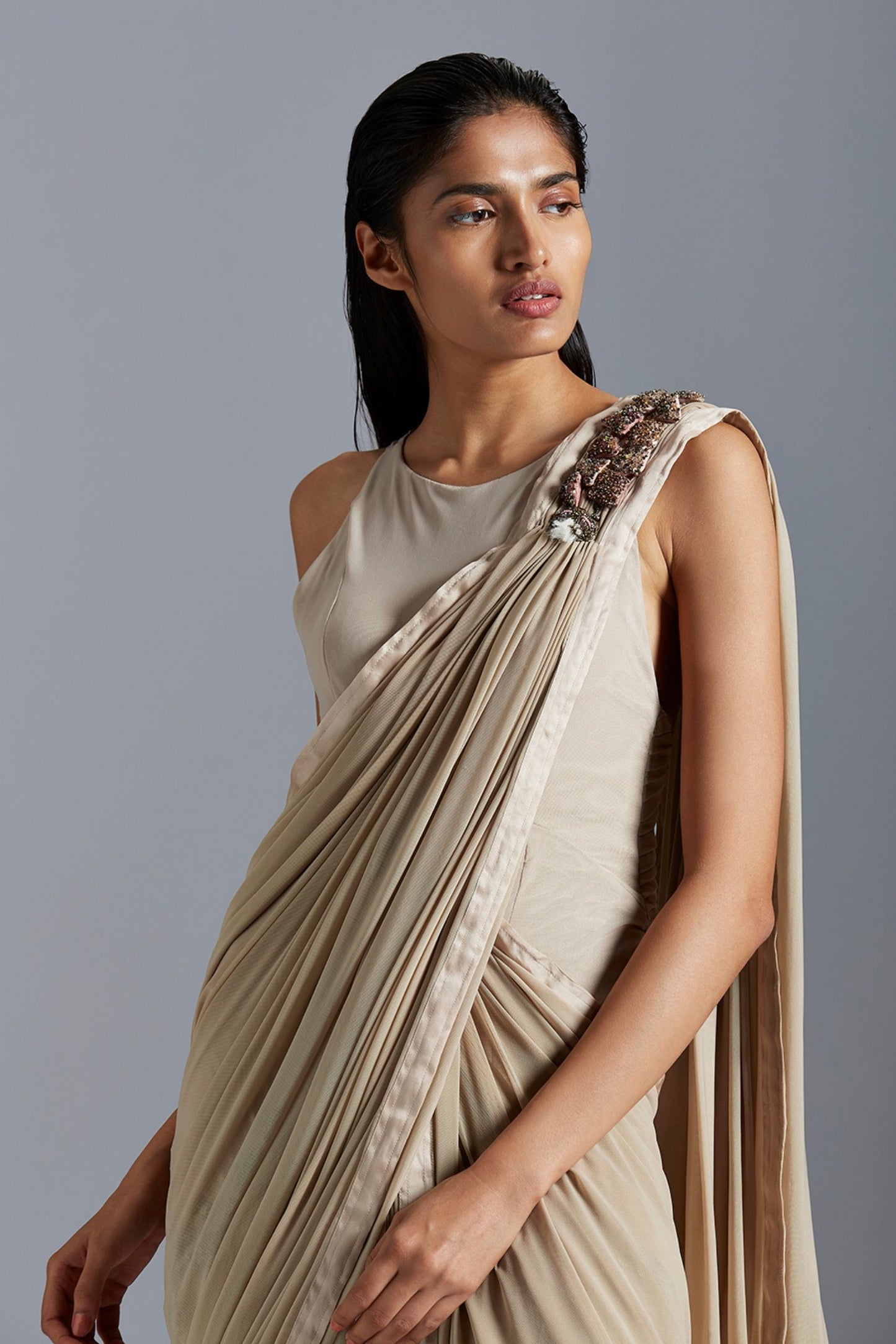 Close-up of the handmade bead embroidery on the Icicle gown saree, highlighting the detailed craftsmanship