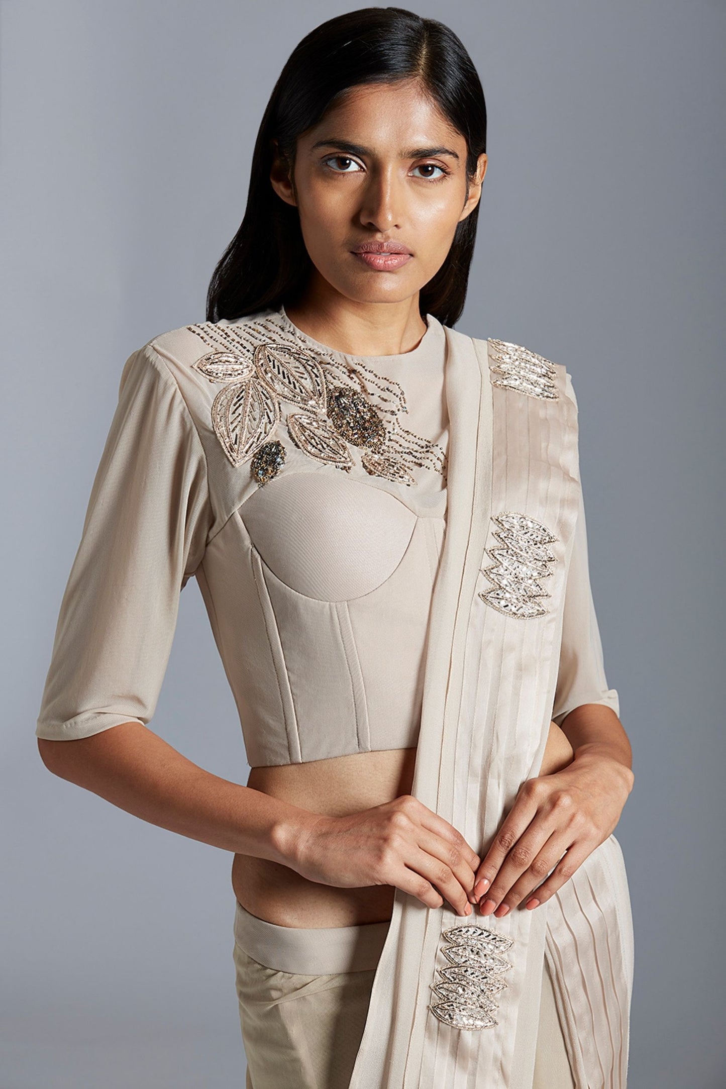Close-up of the handmade Mukaish embroidery on the corset blouse top, showcasing the fine craftsmanship and intricate design