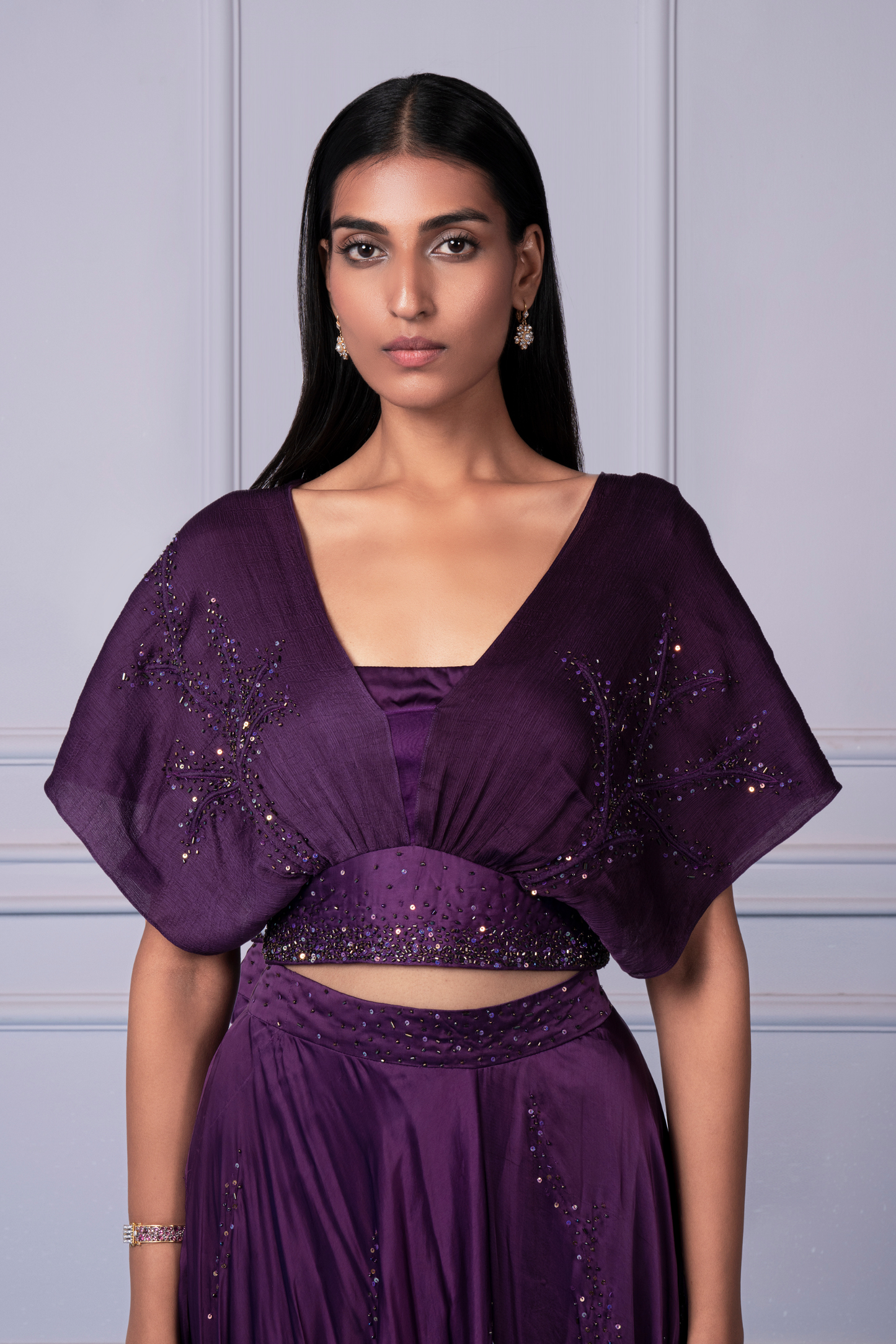 Close-up of the embroidered beadwork on the Midnight blouse, highlighting the intricate design details