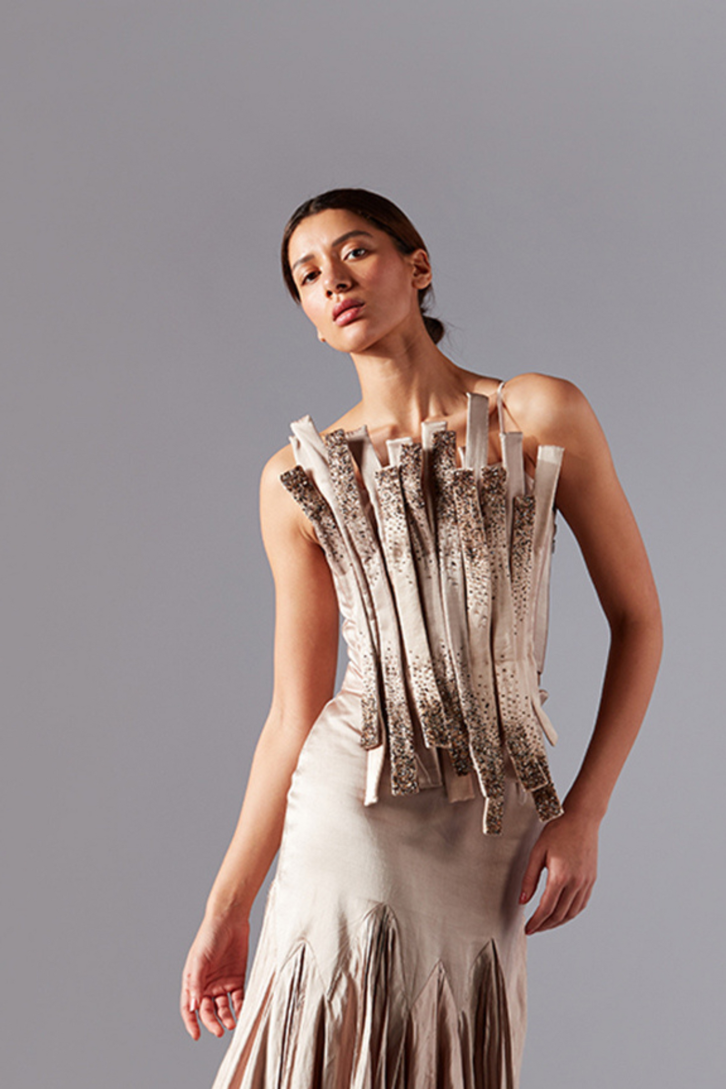 Model wearing the stylish designer top with bouquet corset design, featuring handmade embroidery and onyx embellishments, perfect for a chic and elegant look