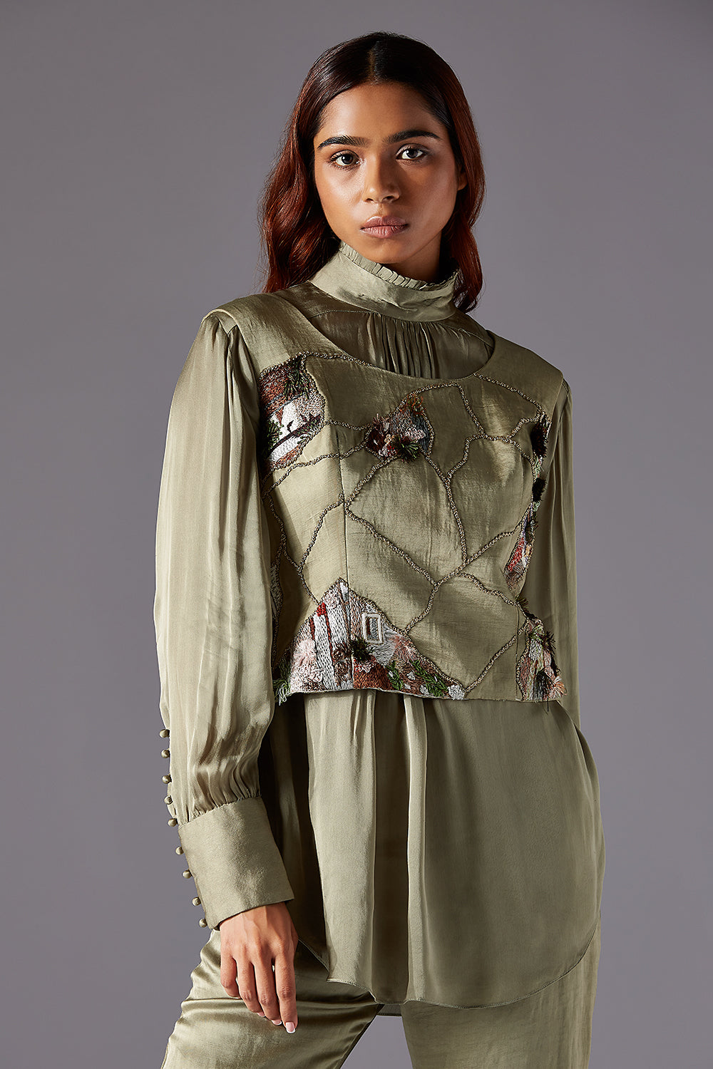 Detailed Focus on Embroidery on Waistcoat and Abstract Patches on Sharara Dress