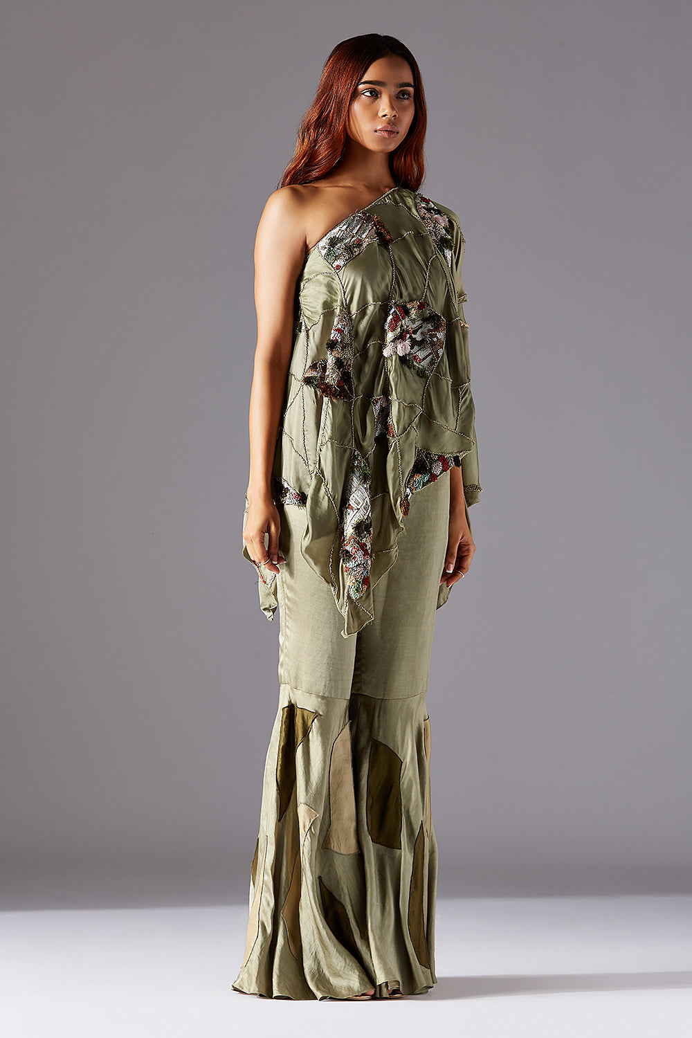 Model Wearing One Shoulder Cape & Designer Sharara Dress for Women at a Luxury Event