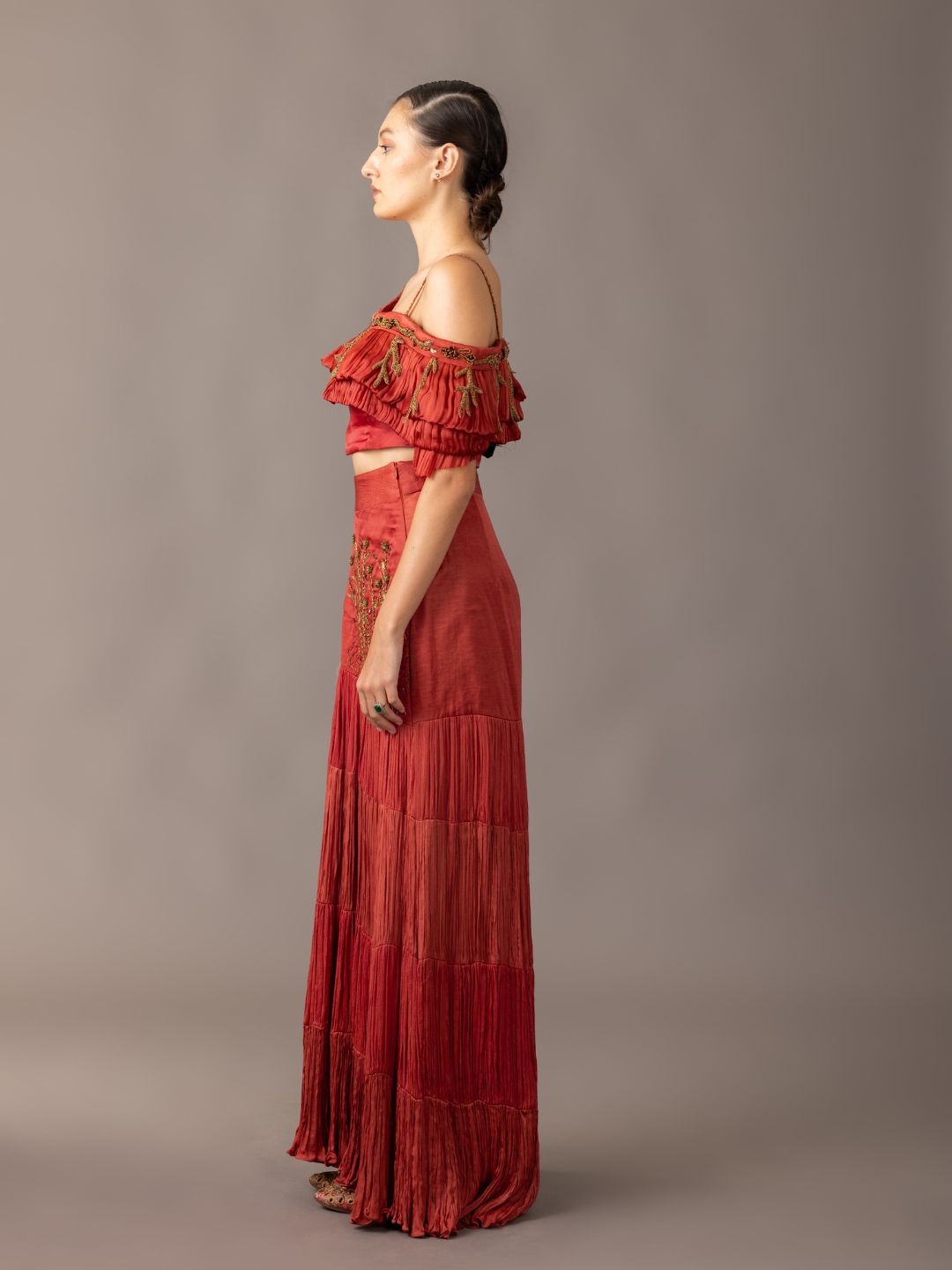 Elegant Gill Fungi Blouse paired with a pleated Thar Skirt, perfect for upscale parties and events