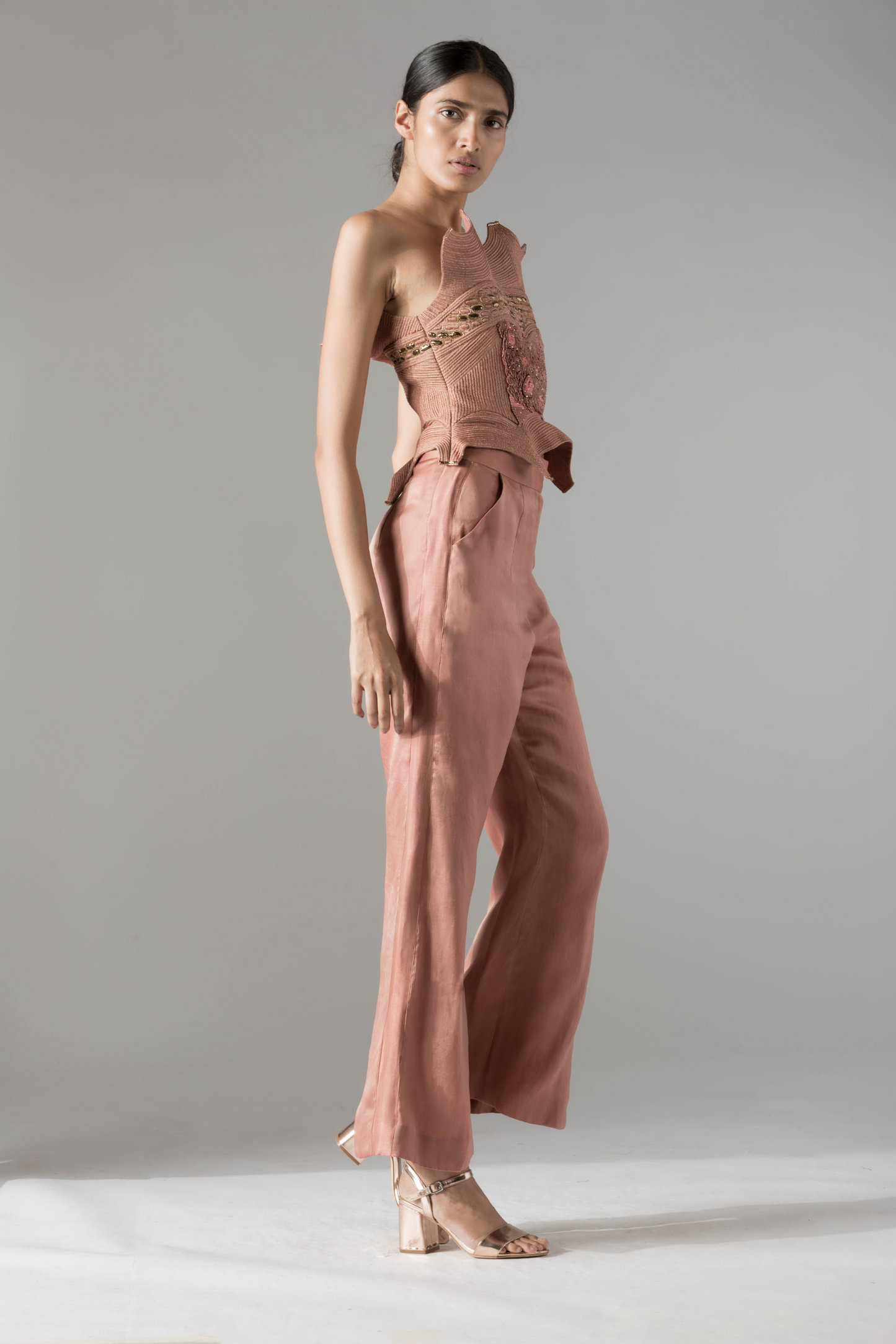 Side view of the Dune corset top, emphasizing its flattering fit and elegant design