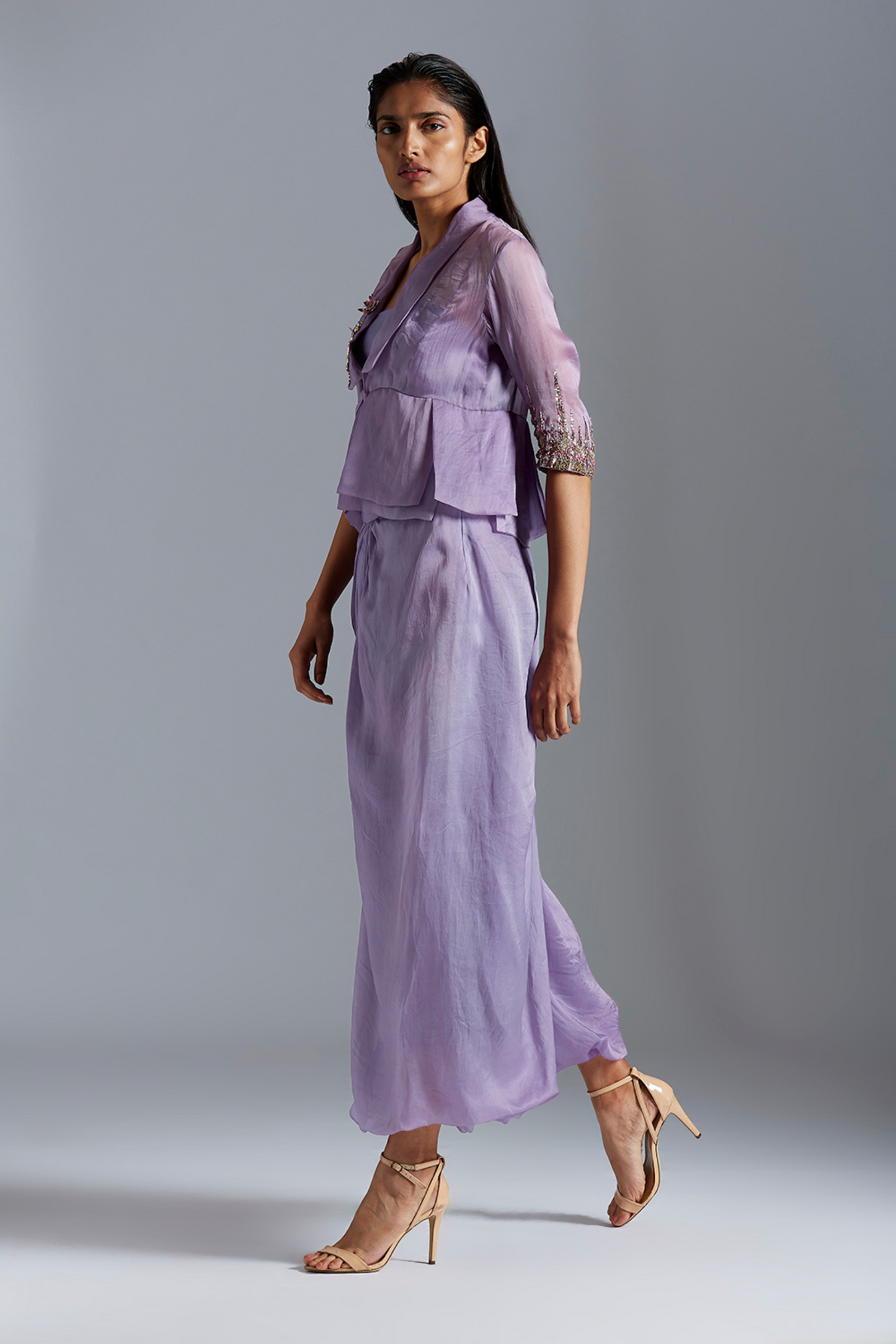 Side view of the dhoti pants and top for women, emphasizing the flow and fit of the outfit with intricate embroidery details