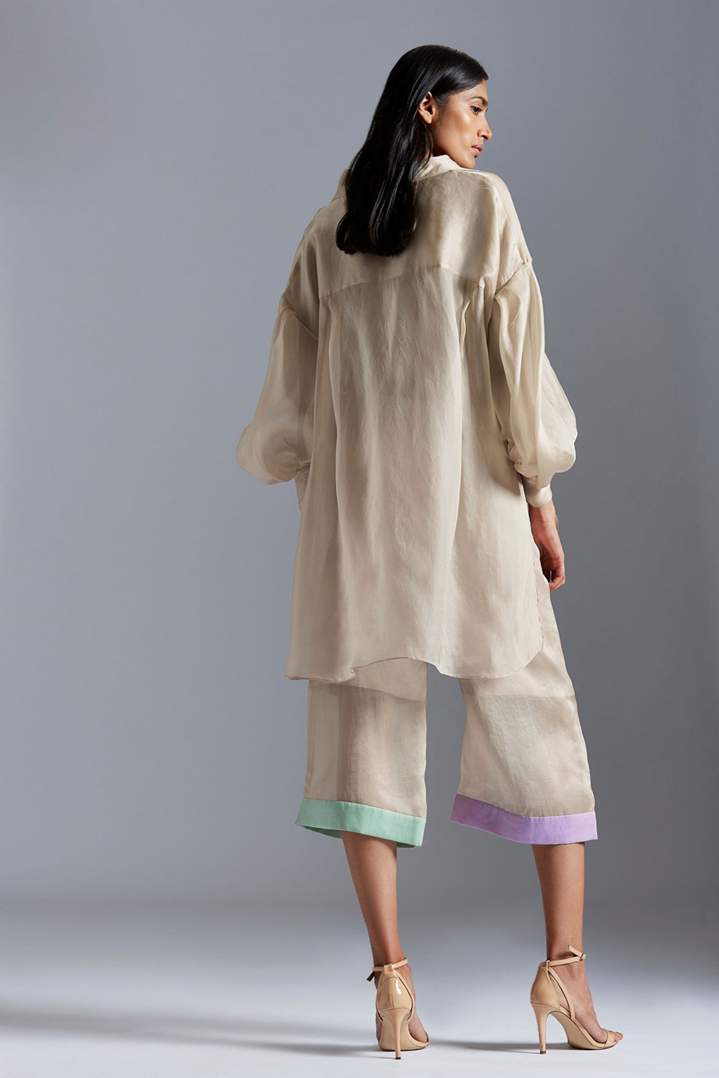 Back view of the co-ord set, showcasing the elegant flow and fine craftsmanship of the satin organza fabric