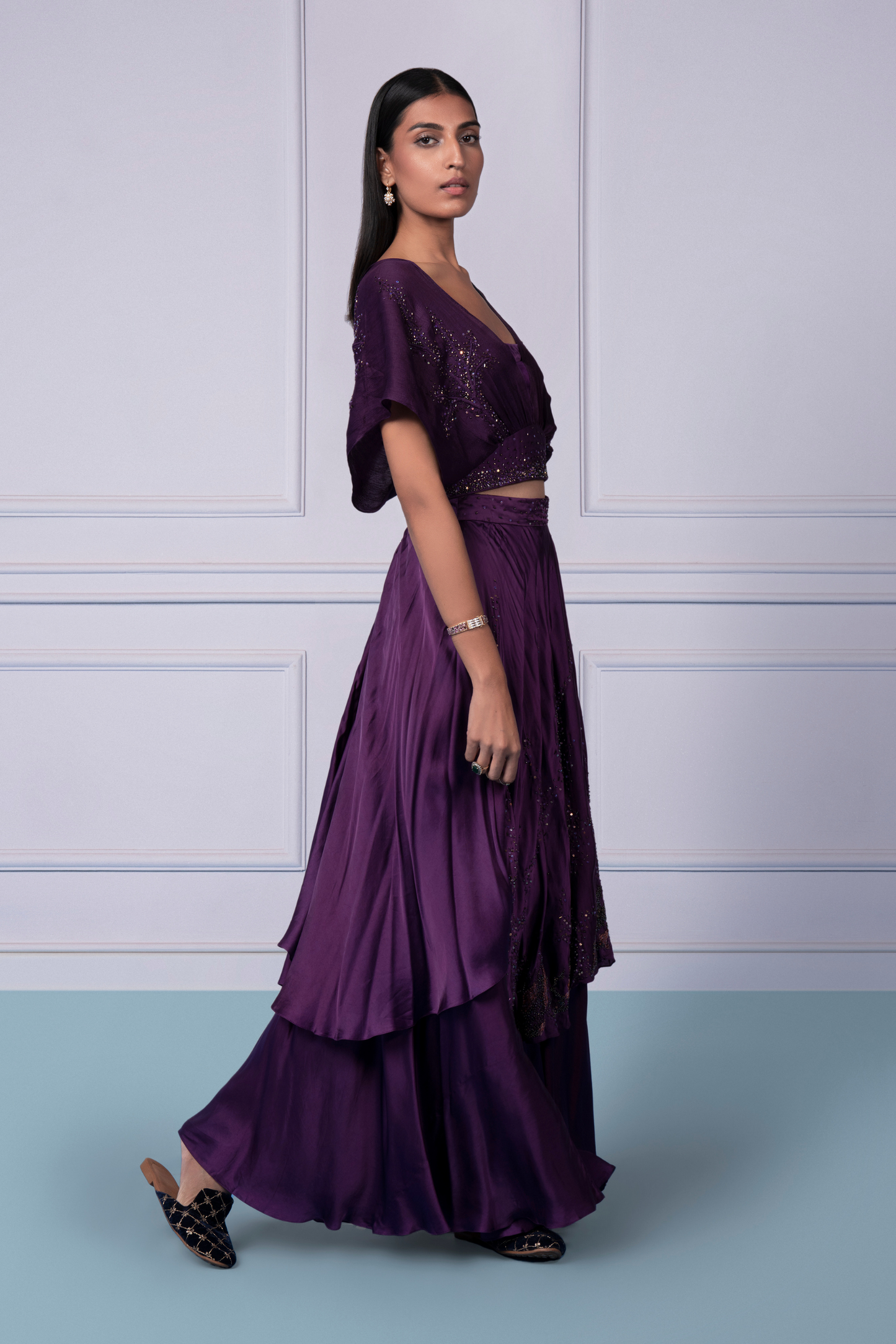 Side view of the Midnight embroidered blouse with 2-tier skirt, emphasizing the flattering silhouette and stylish design