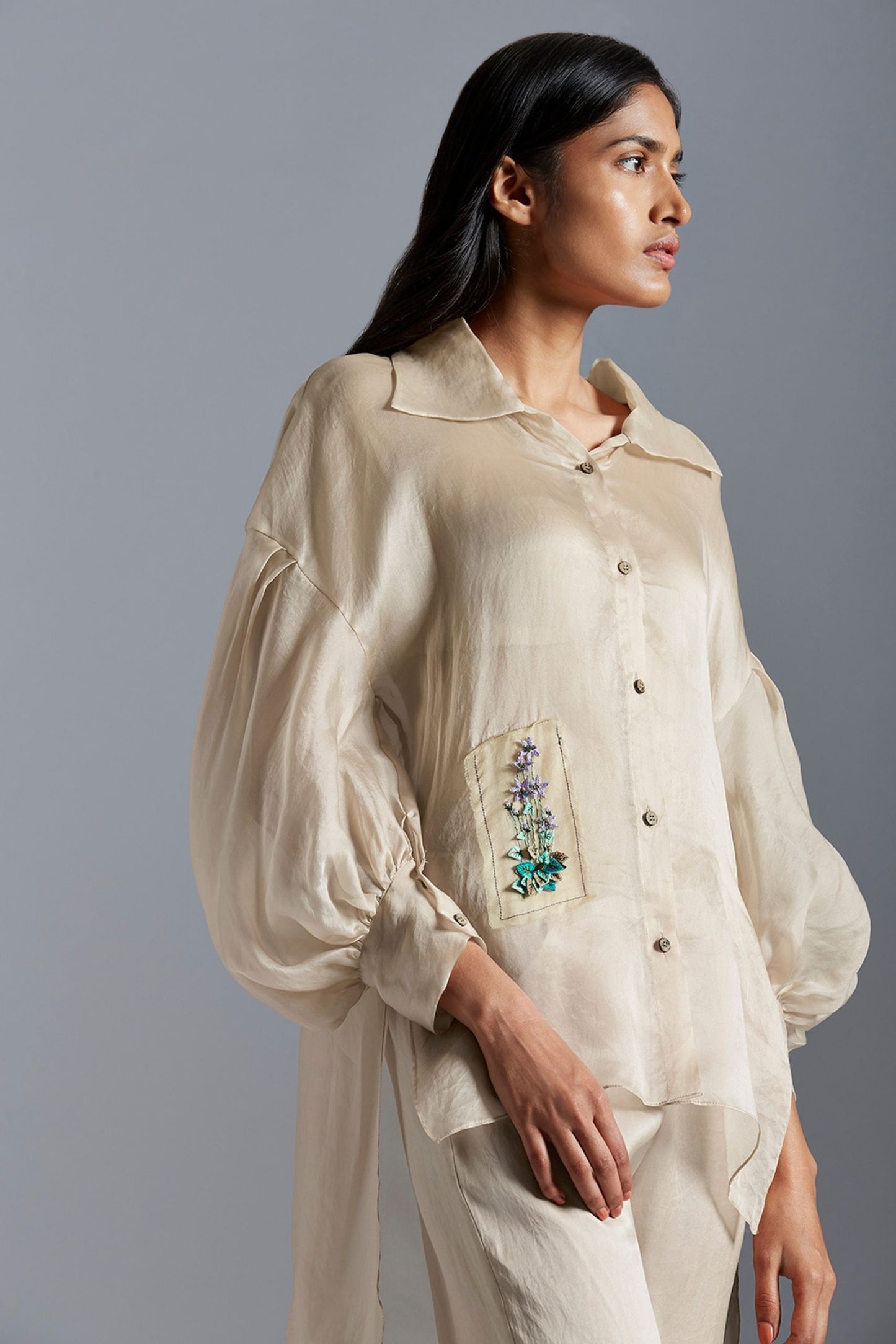 Close-up of the floral embroidery on the co-ord set, highlighting the intricate design and luxurious satin organza fabric