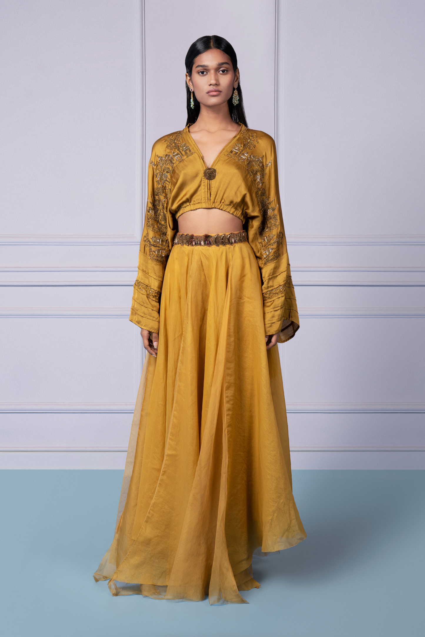 Yellow kimono top with metallic embroidery paired with an organza lehenga, a stylish top and lehenga set for women
