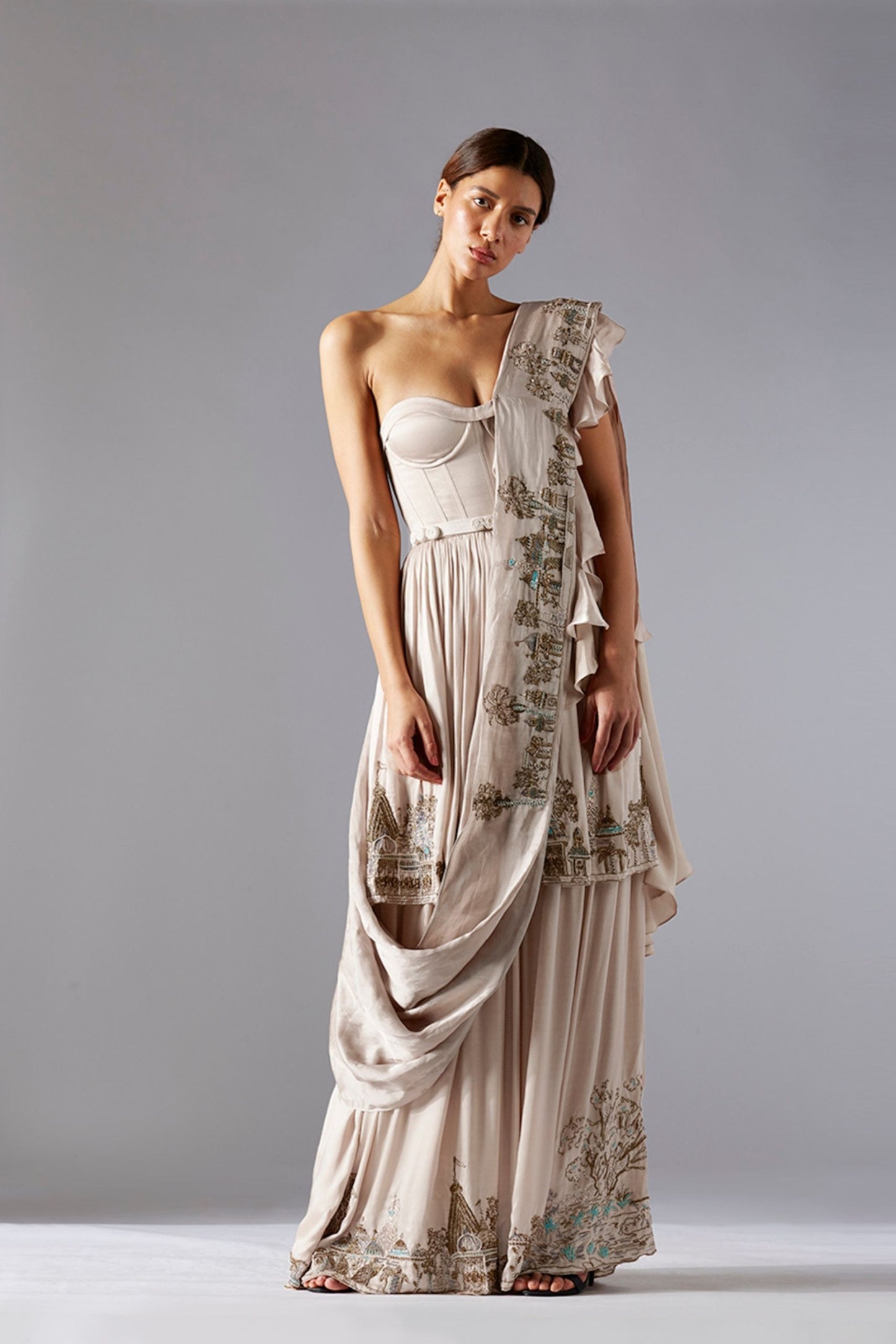 Designer Indo Western gown for women with golden metallic handwork and a frill dupatta, perfect for elegant fusion fashion