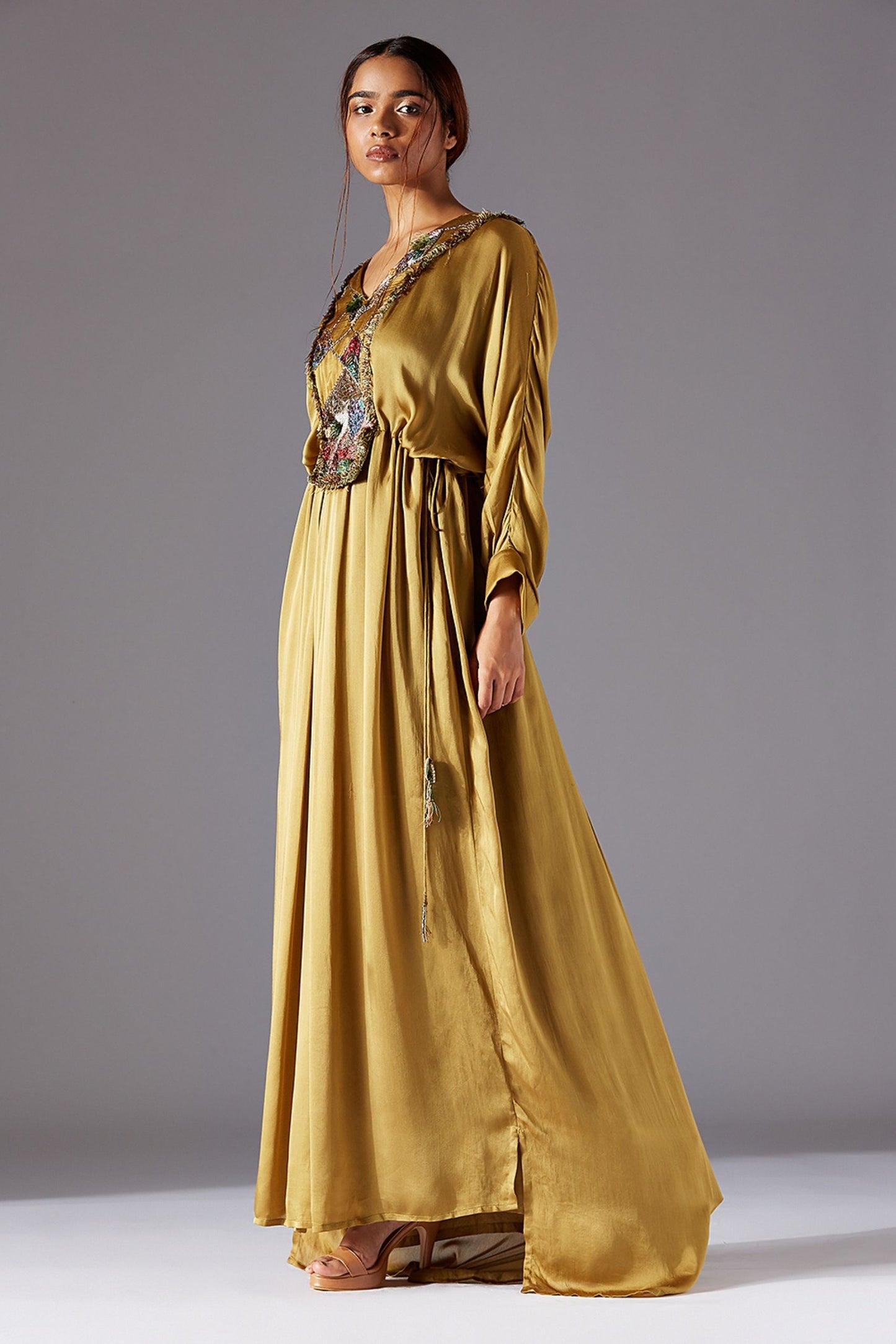Women Wearing Minicoy Kaftan Dress with V-neck and Full Sleeves at a Stylish Event