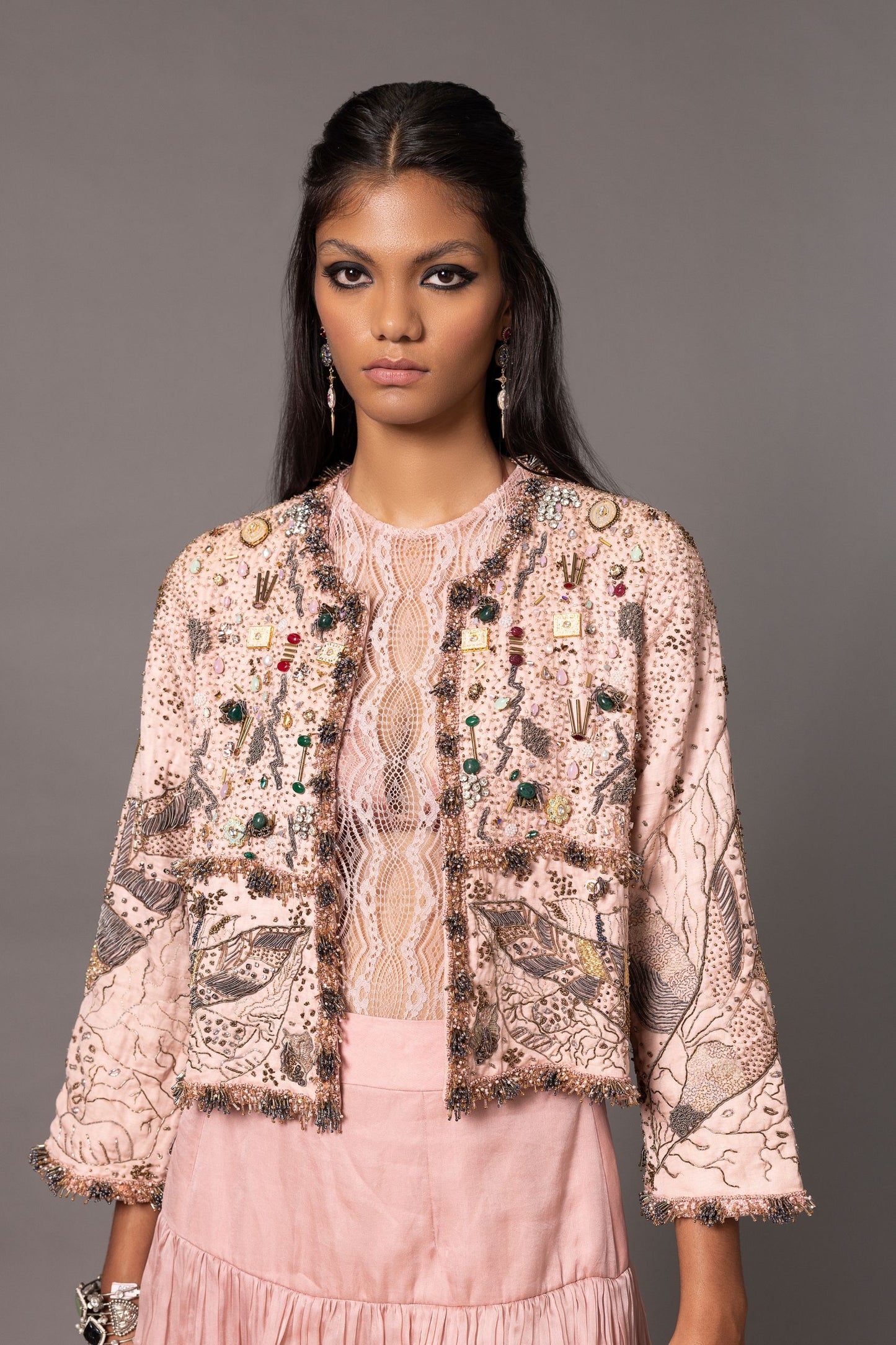 Close-up of the multimedia embroidery on the Sang-e-Sitara Pink Jacket, highlighting the intricate detailing and design
