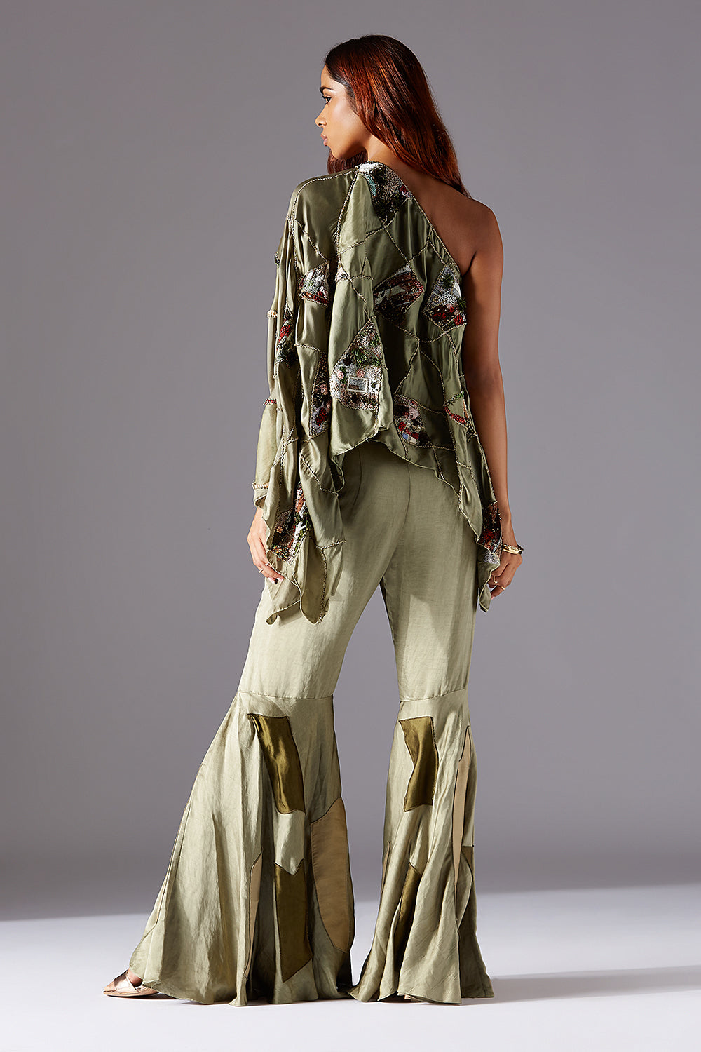 Back View of One Shoulder Cape & Designer Sharara Dress with Luxury Details and Asymmetrical Hemline