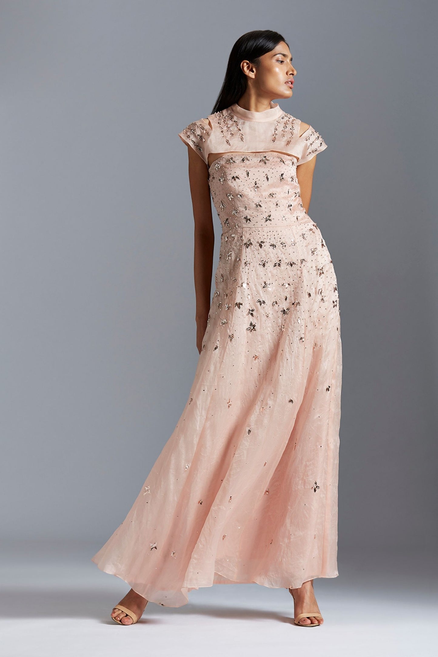 Elegant designer gown with satin organza fabric and handmade mukaish work, perfect for modern women’s occasions
