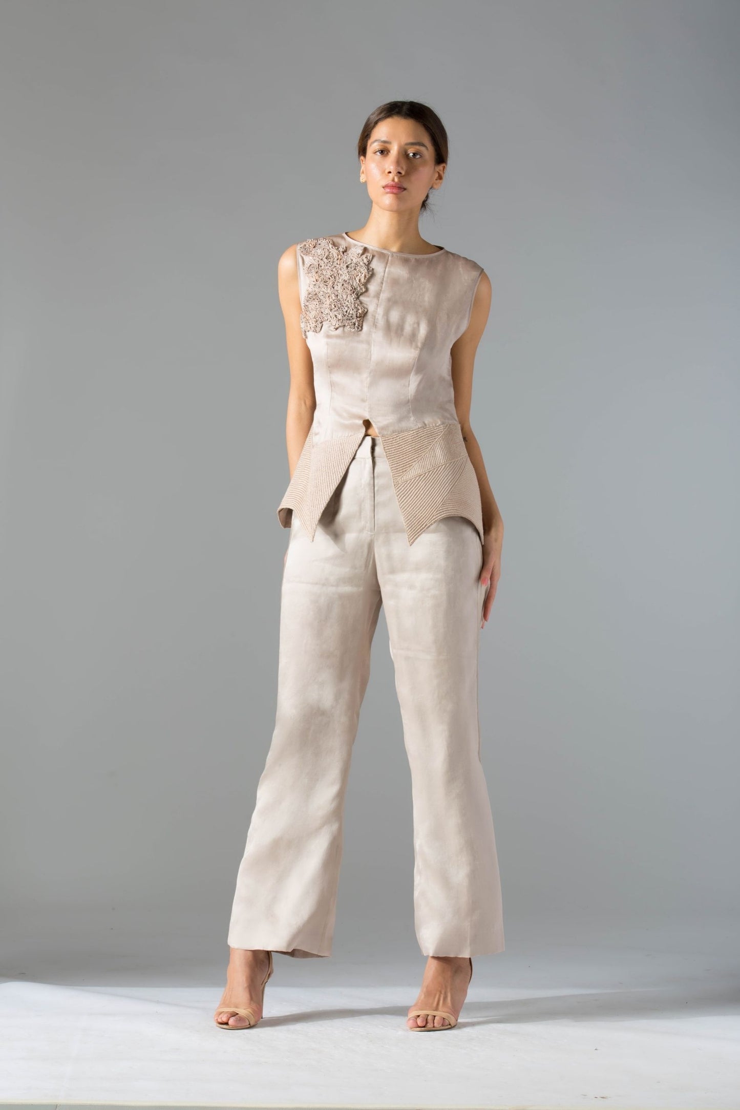 Designer co-ords set for women with fabric manipulation, hand embroidery, and high-waisted organza pants, offering a stylish and modern look