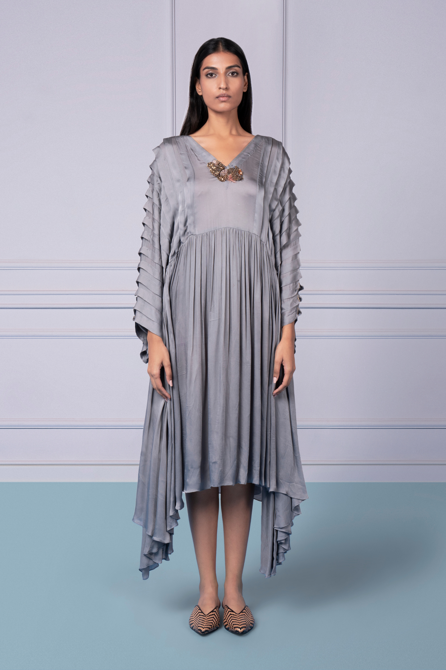 Stylish modern kurta for women with mushroom pleats and high-low hemline