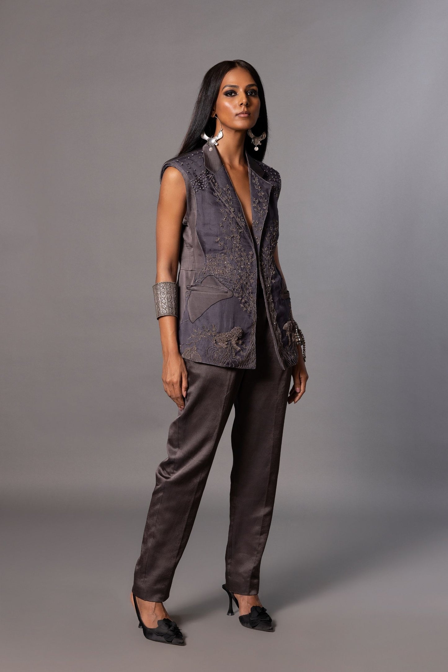 Shikhar Baugh Charcoal Embroidered Jacket with intricate motifs, paired with classic trousers for a stylish women's outfit
