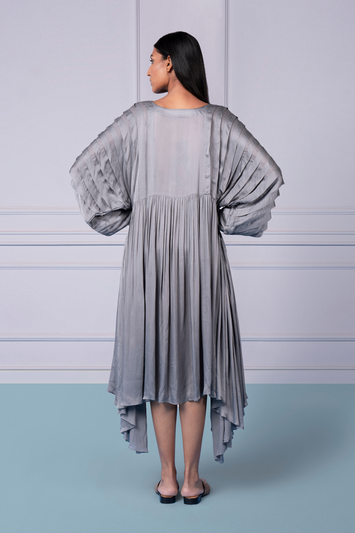 Back view of the modern kurta for women showcasing the unique pleats and design