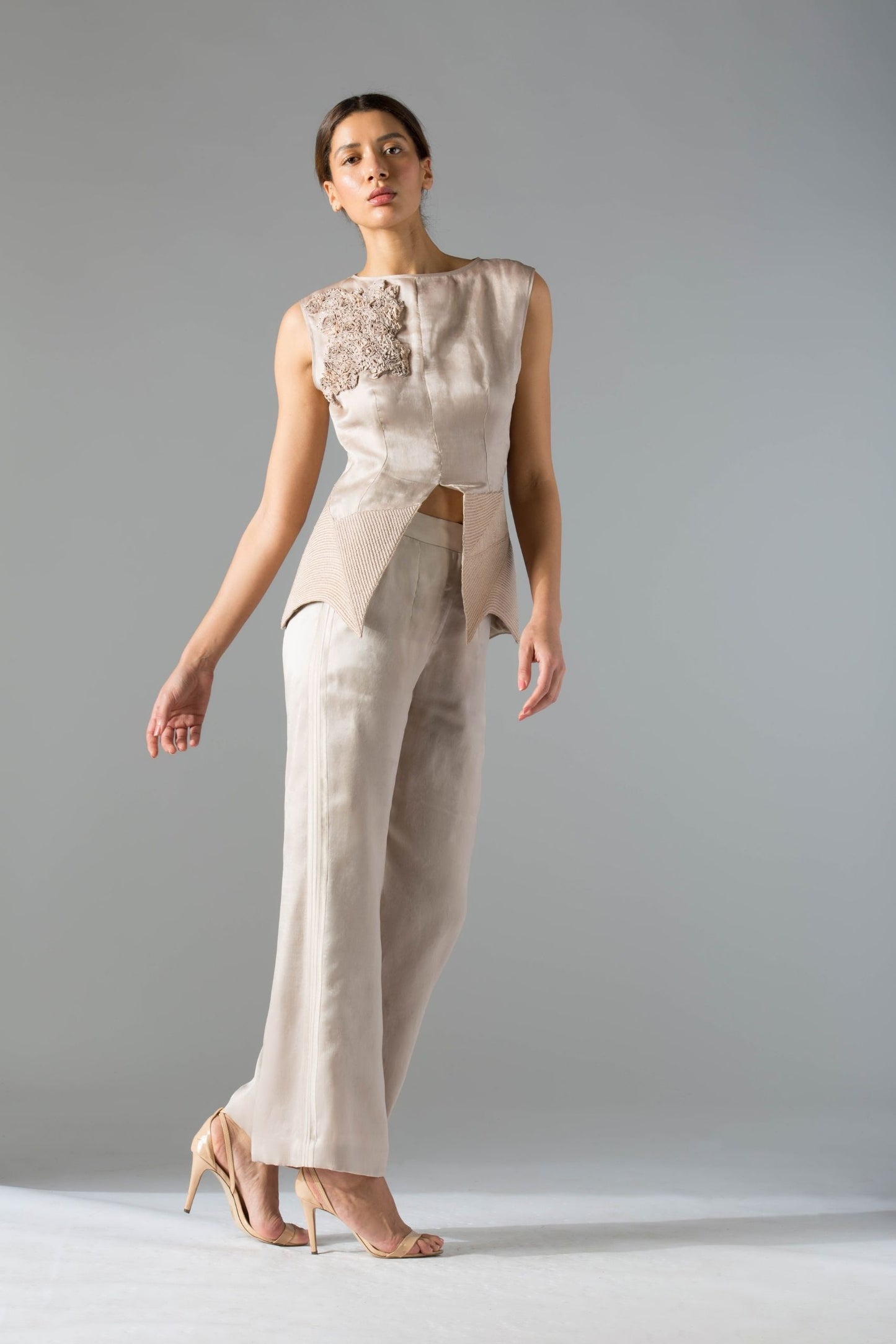 Designer co-ords set for women featuring fabric manipulation, hand embroidery, and high-waisted organza pants for a chic and stylish look