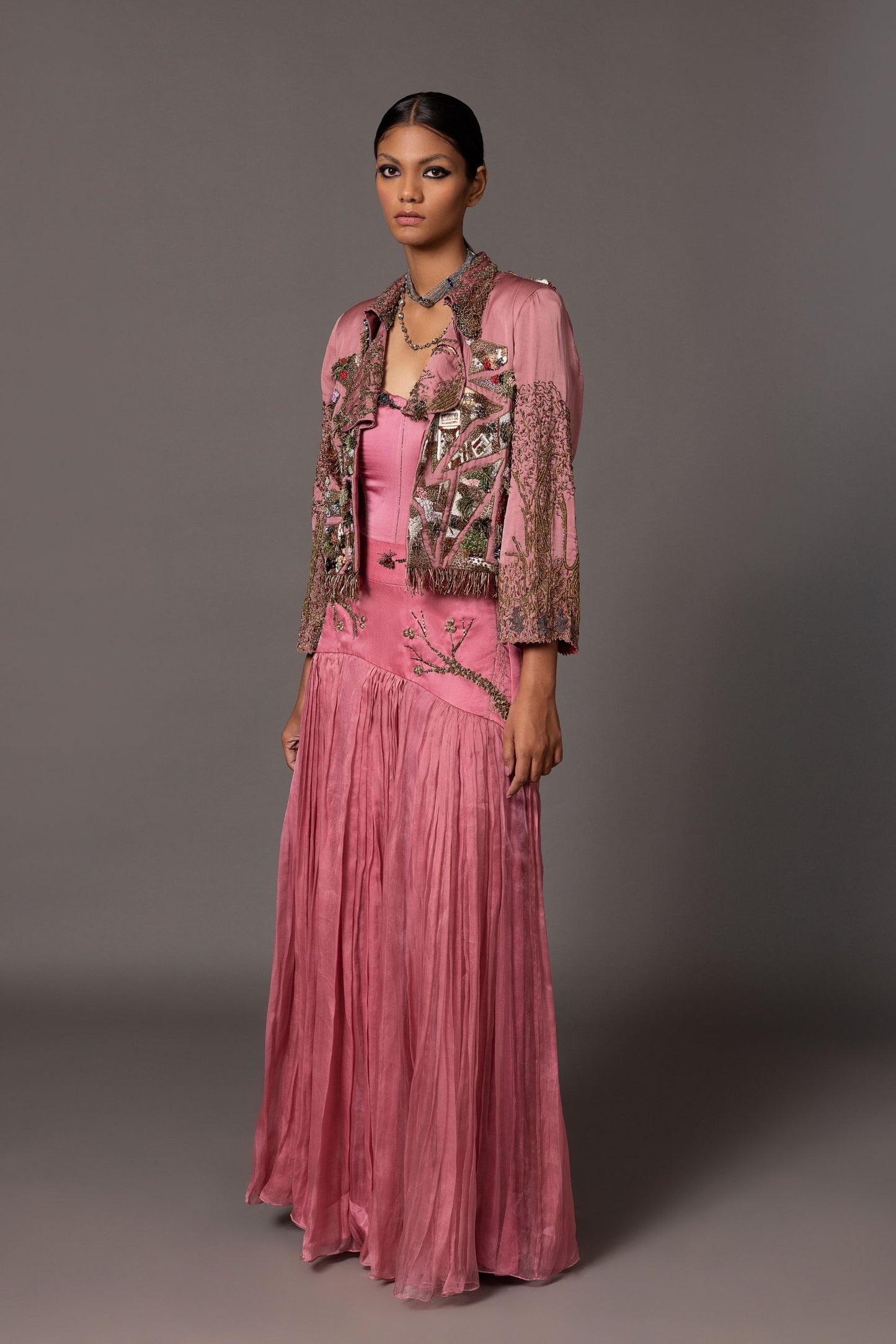 Kaner Pink Corset Top & Skirt with Earth Jacket featuring heavy multimedia embroidery, available at A Humming Way. Shop now!