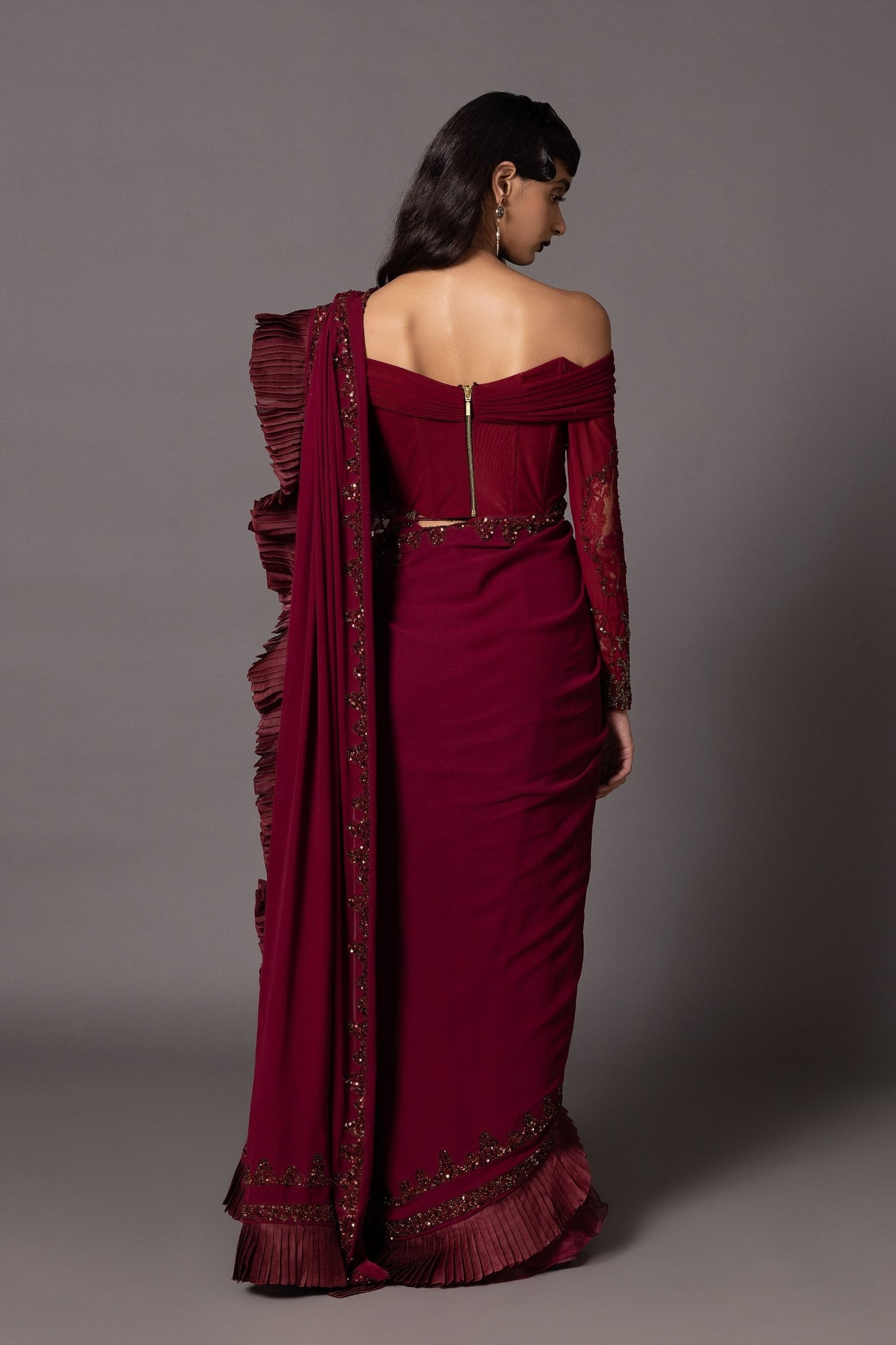 Maroon sequin blouse with exquisite blouse embroidery work and beads, designed in an off-shoulder saree blouse style