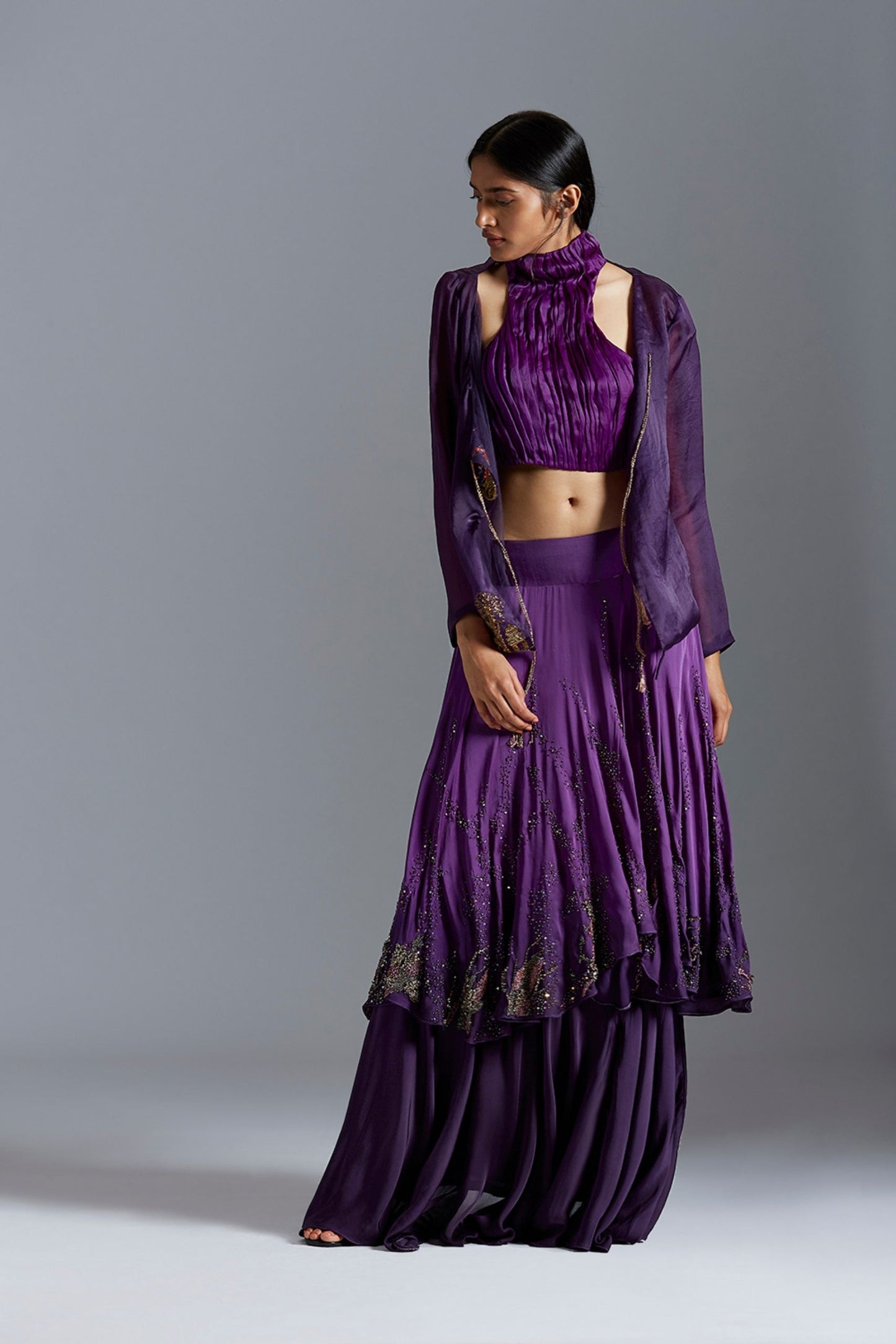Crop top lehenga set with an embroidered Angarakha coat, perfect for women seeking stylish and timeless fashion
