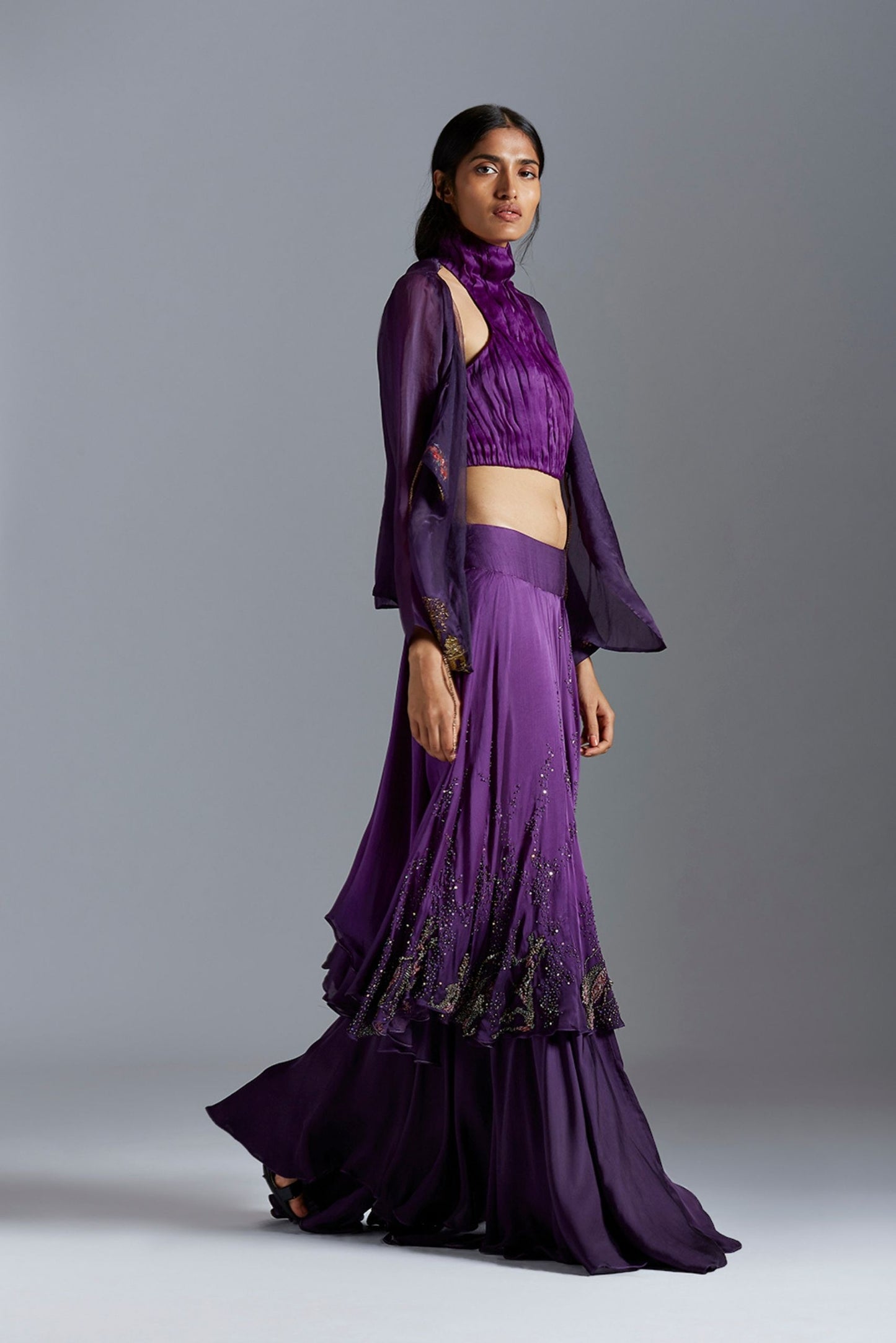 Side view of the crop top lehenga set with Angarakha coat, highlighting the silhouette and layered style