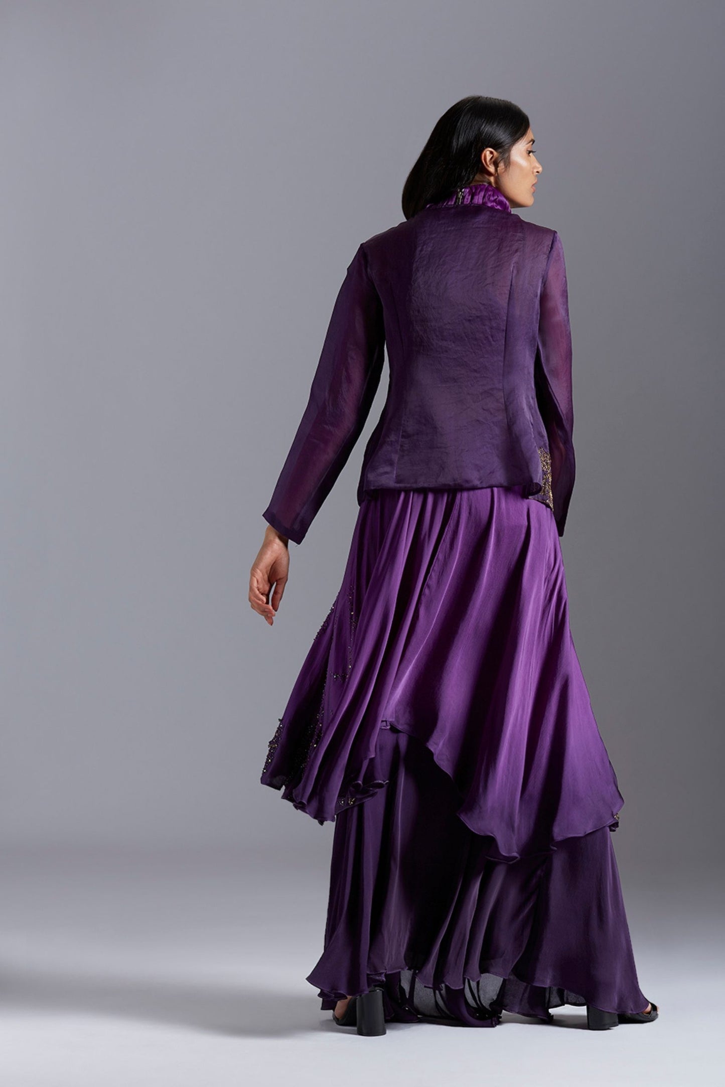 Back view of the crop top lehenga set with Angarakha coat, emphasizing the design and fit of the outfit