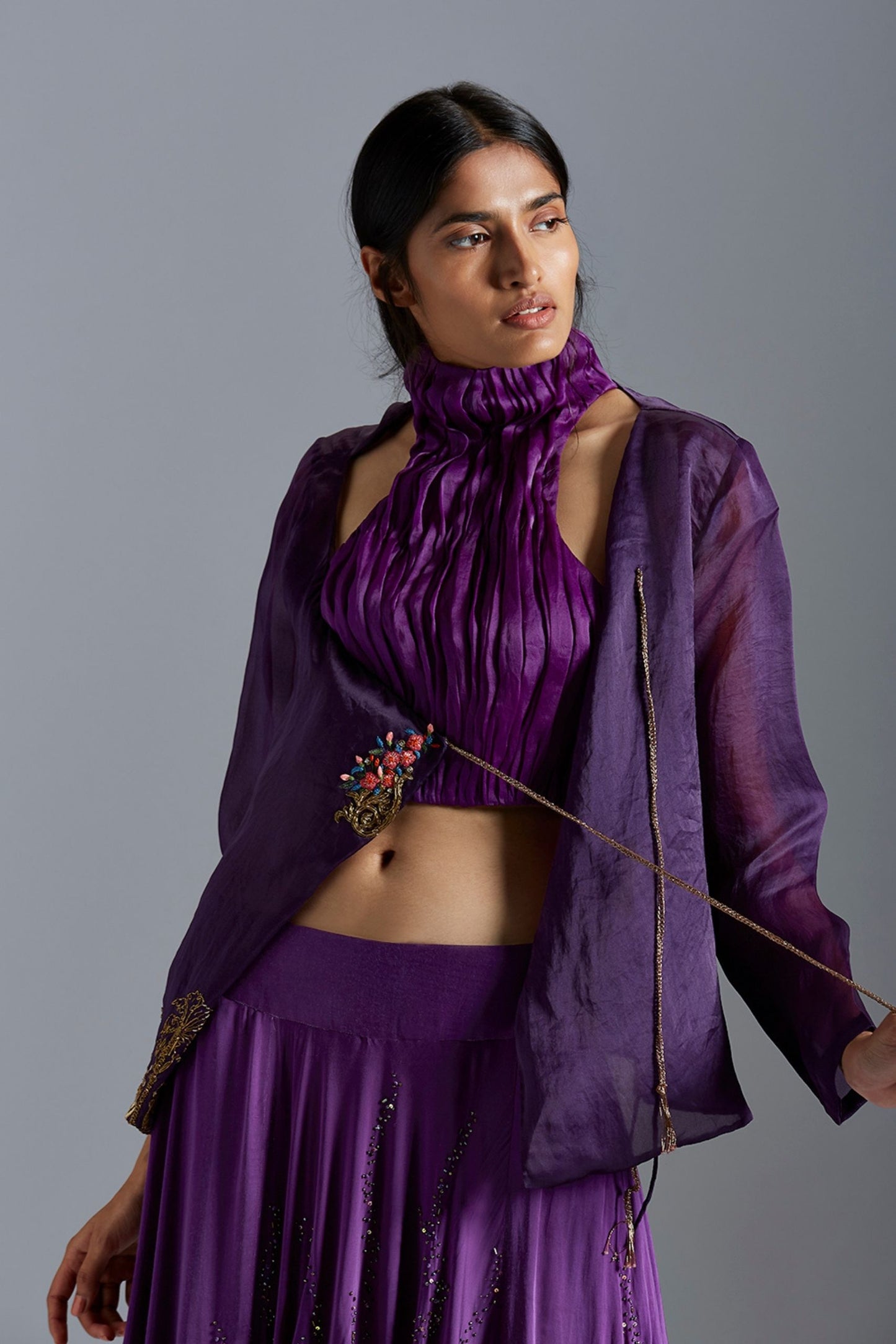 Crop top lehenga set with embroidered Angarakha coat, offering a stylish and timeless fashion look for women