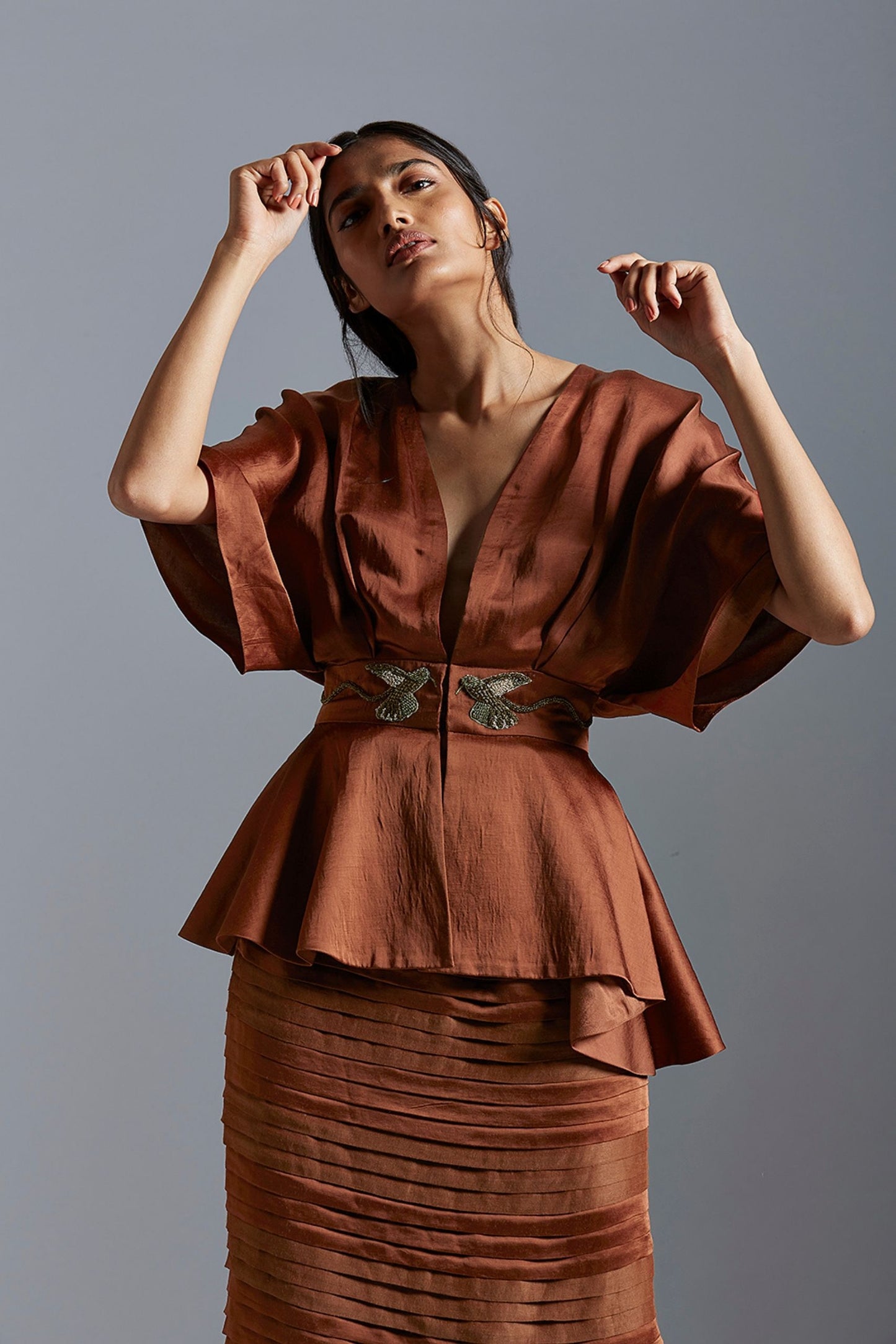 Close-up of the handmade embroidery on the kimono sleeve top, highlighting the intricate design