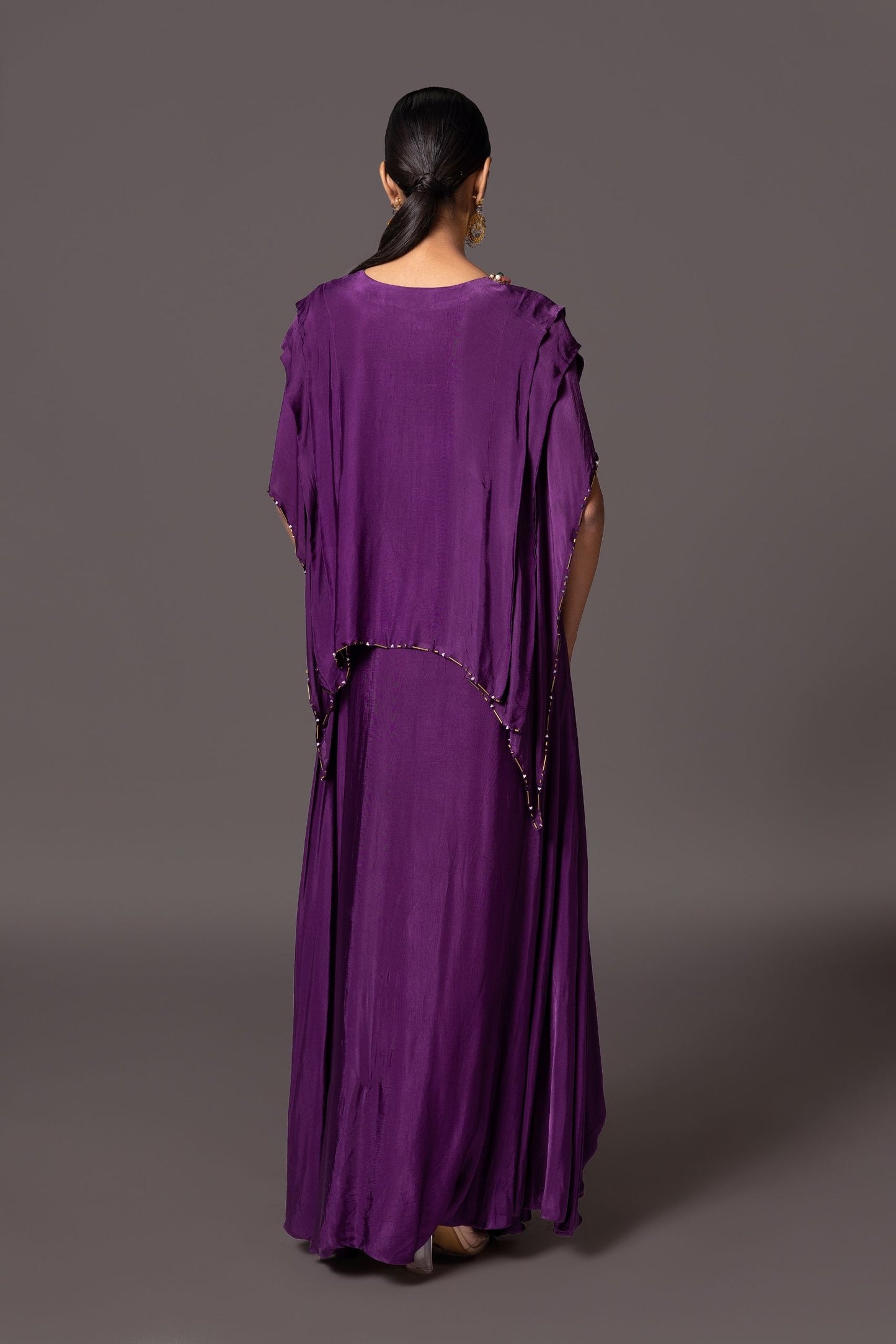 Back view of the Iris Embroidered Kaftan Gown, emphasizing the draped sleeves and overall fit